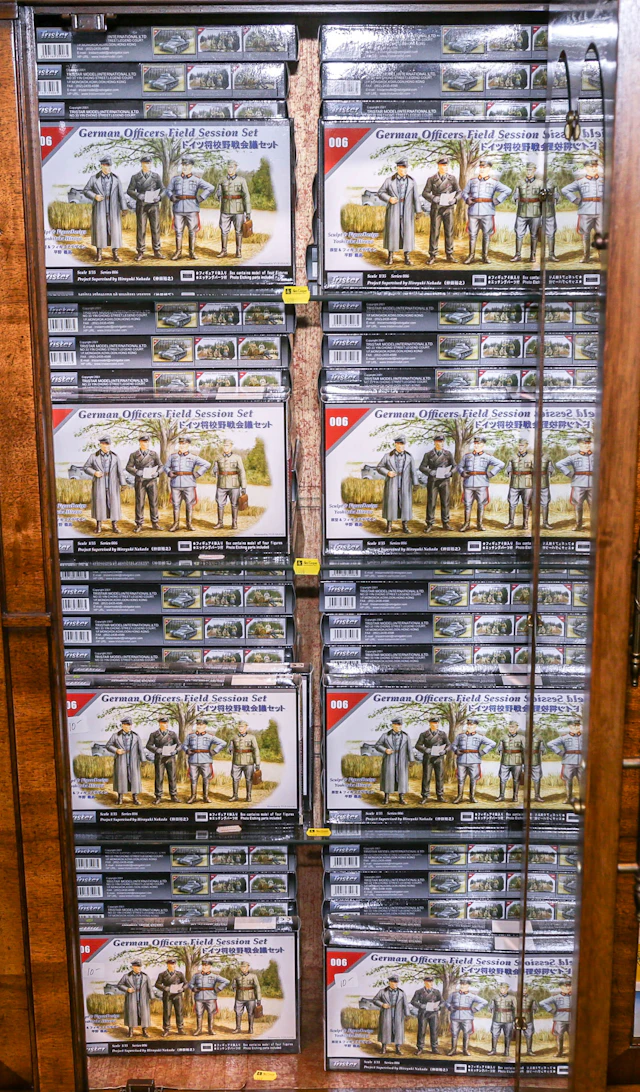 Four Shelves of Tri-Star German Figures