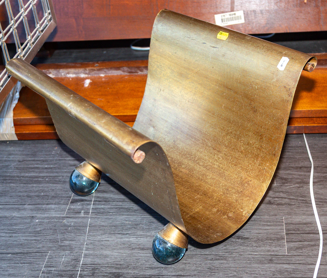 An Art Deco Gilt Iron & Glass Fire Wood Holder