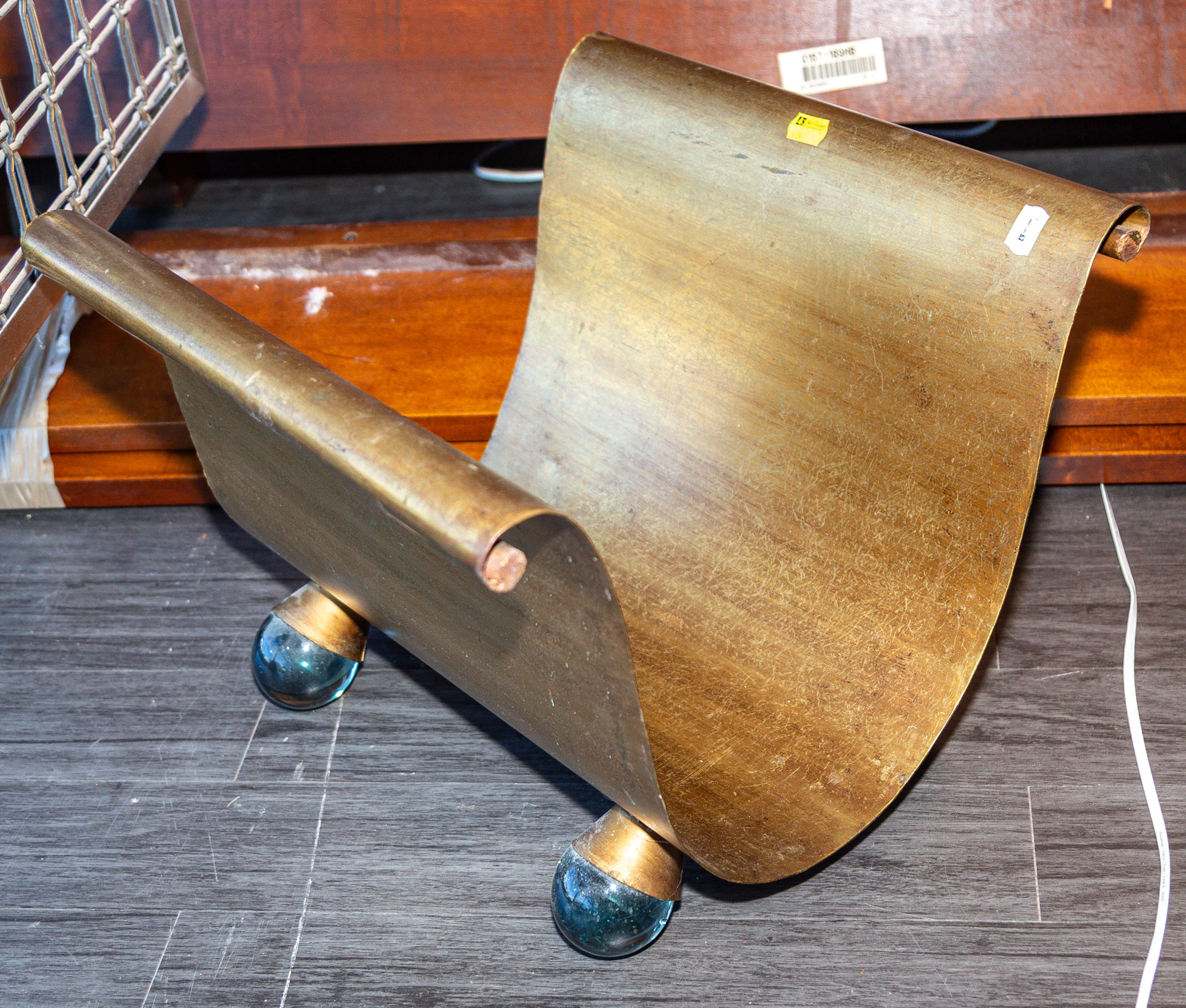 An Art Deco Gilt Iron & Glass Fire Wood Holder