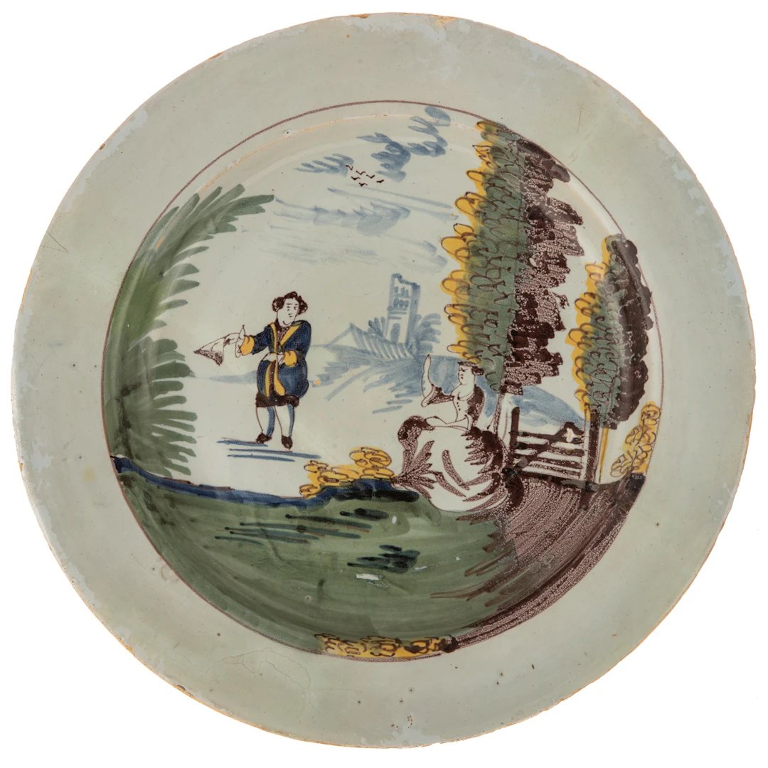 An 18th Century English Delftware Polychrome Dish