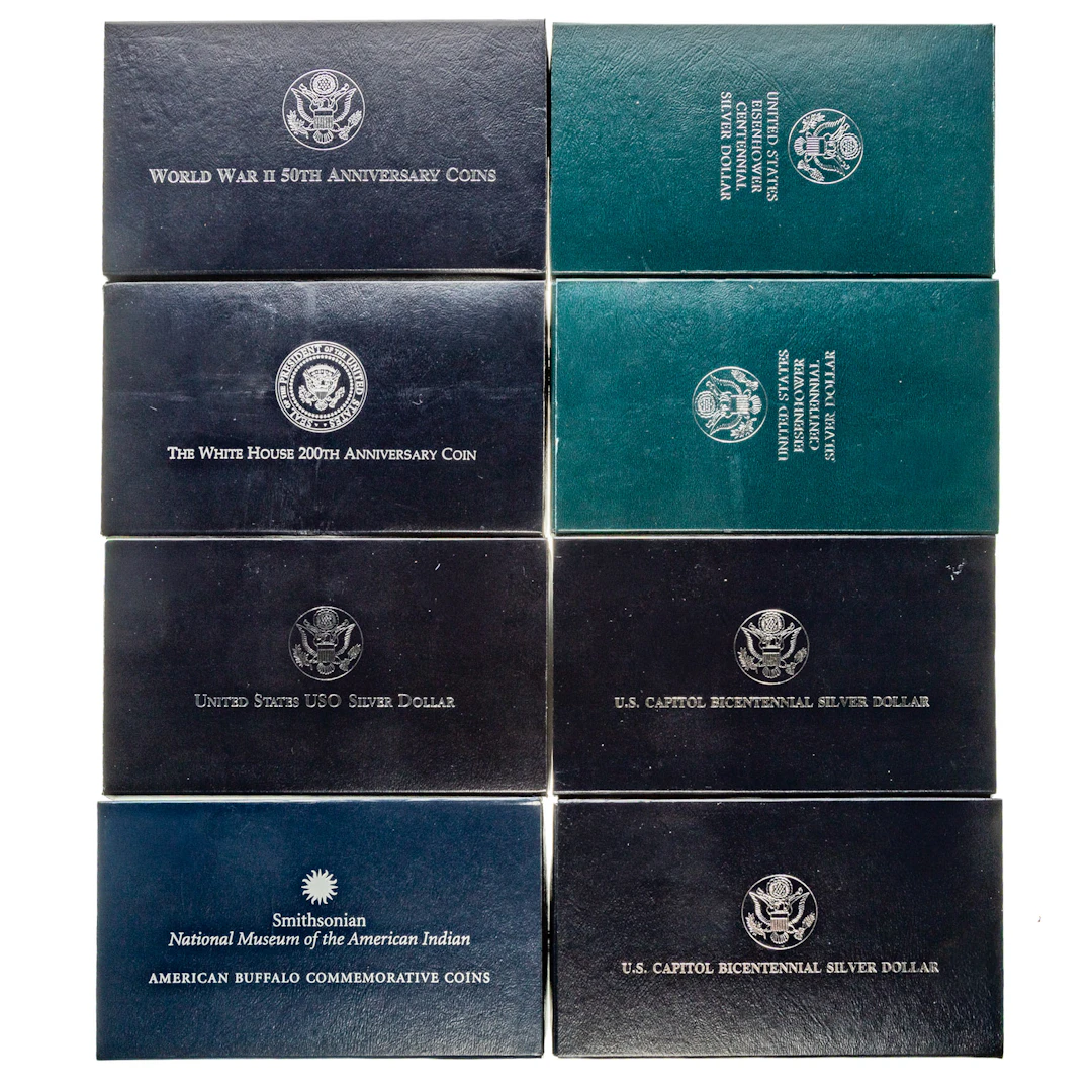 Eight Commemorative Silver Dollar Sets
