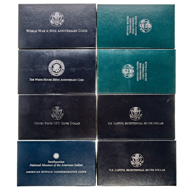 Eight Commemorative Silver Dollar Sets