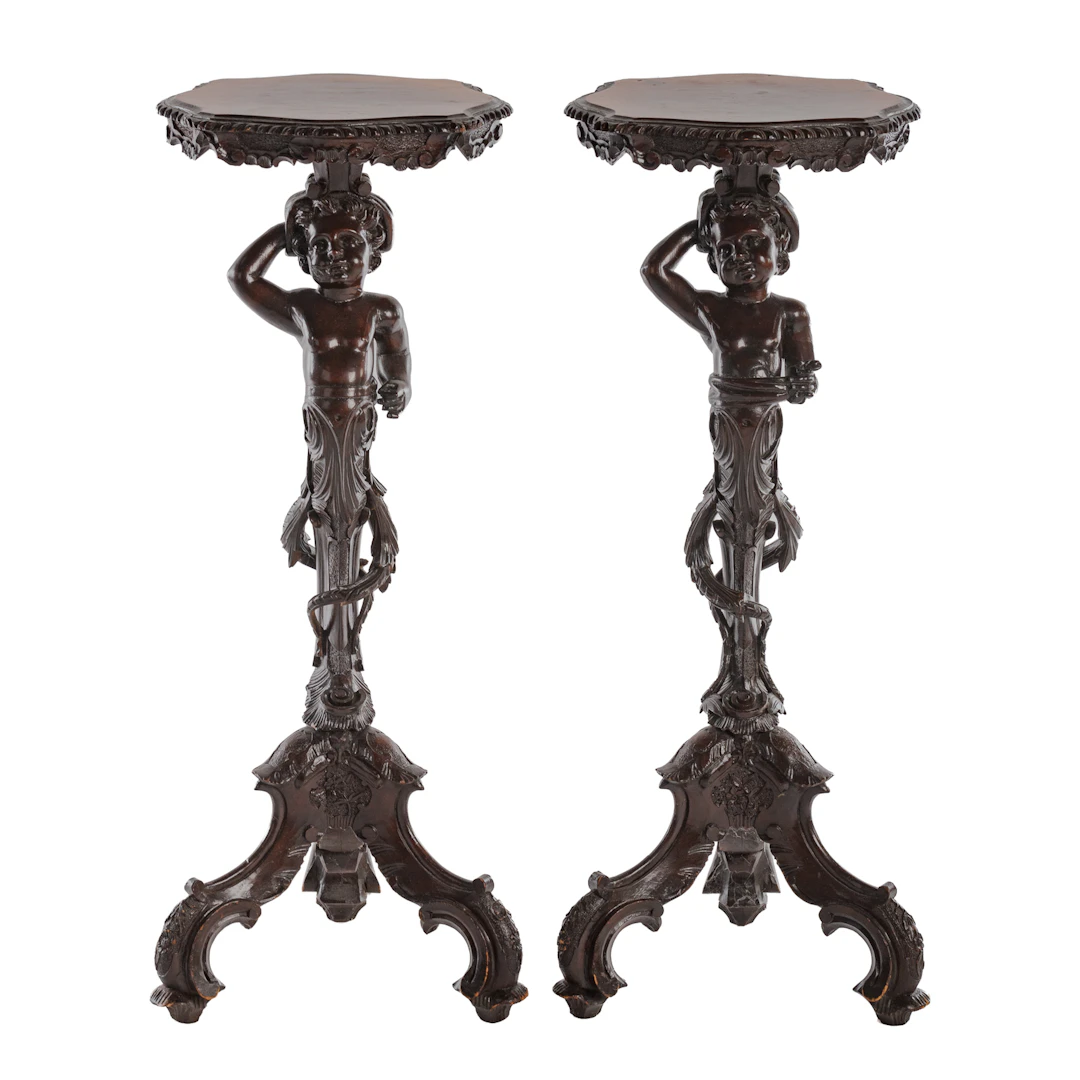 A Pair of Victorian Style Figural Carved Stands