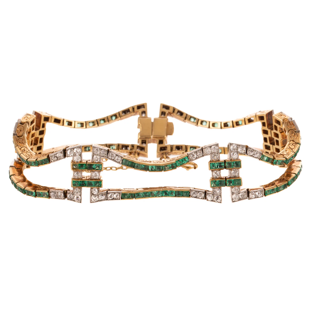 An Art Deco Fluid Diamond & Emerald Bracelet in 18K