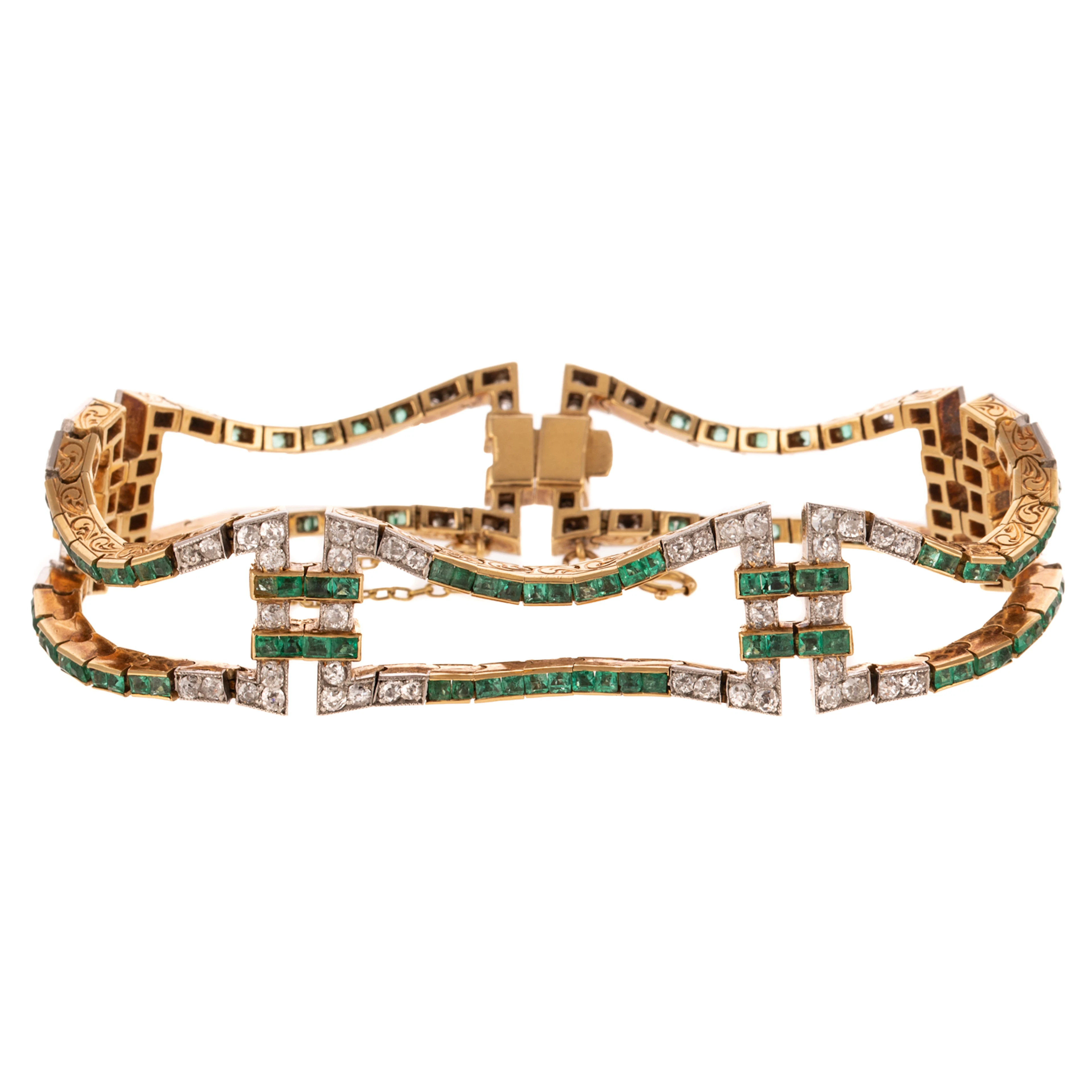 An Art Deco Fluid Diamond & Emerald Bracelet in 18K
