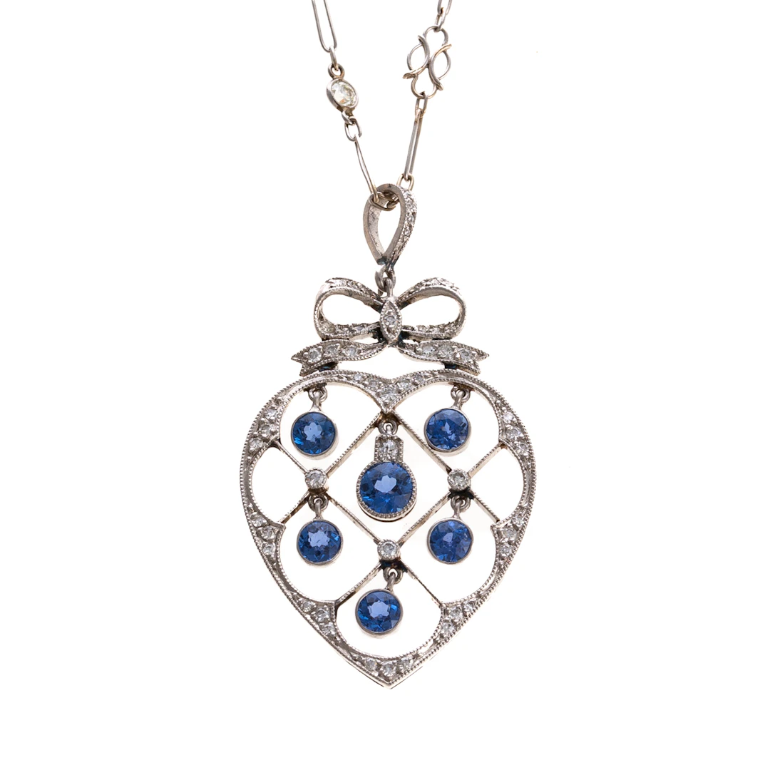 An Edwardian Sapphire & Diamond Heart Necklace in Platinum