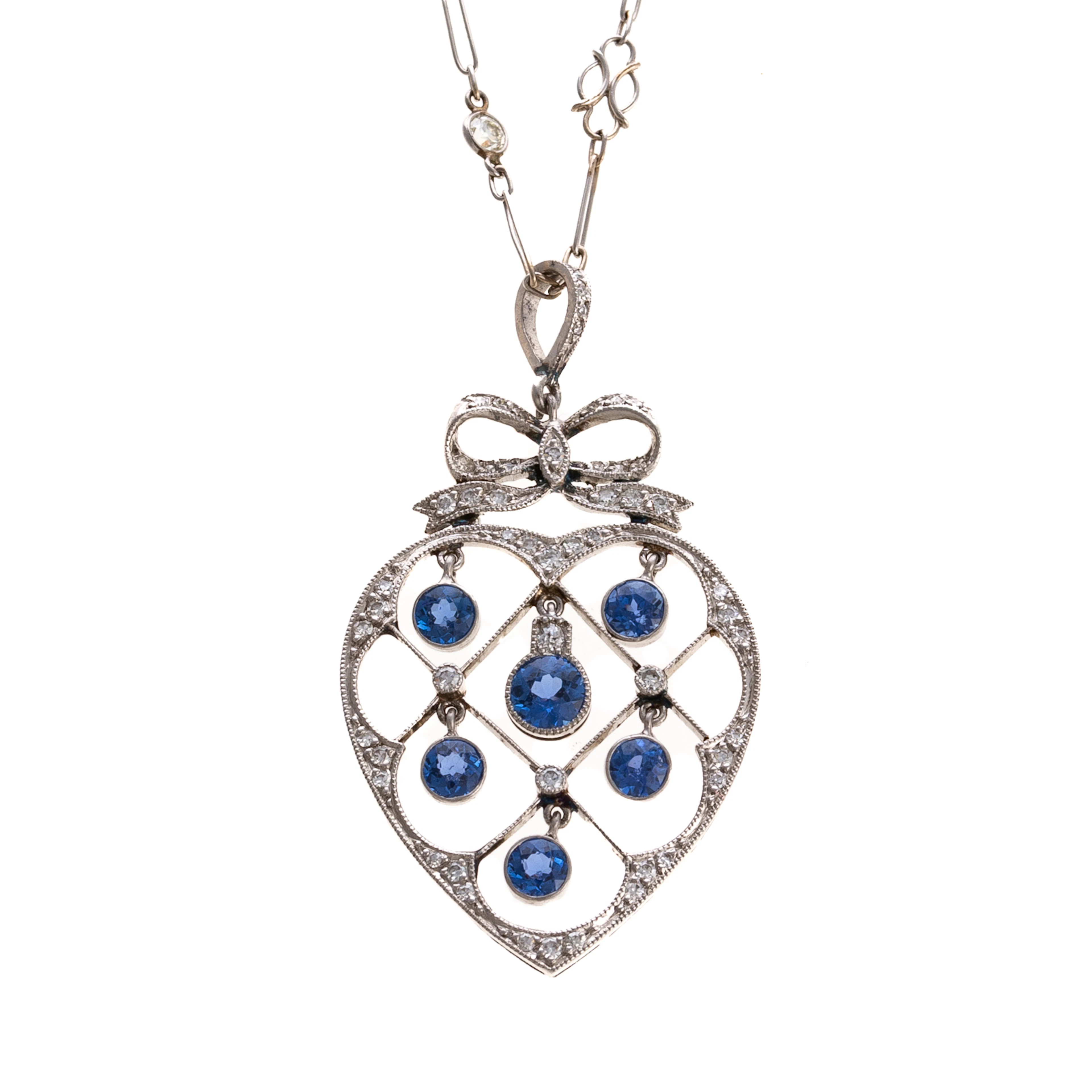 An Edwardian Sapphire & Diamond Heart Necklace in Platinum