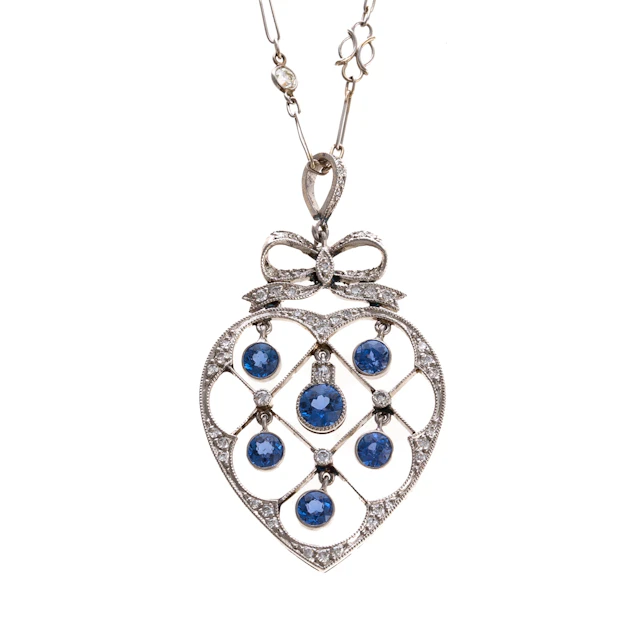 An Edwardian Sapphire & Diamond Heart Necklace in Platinum
