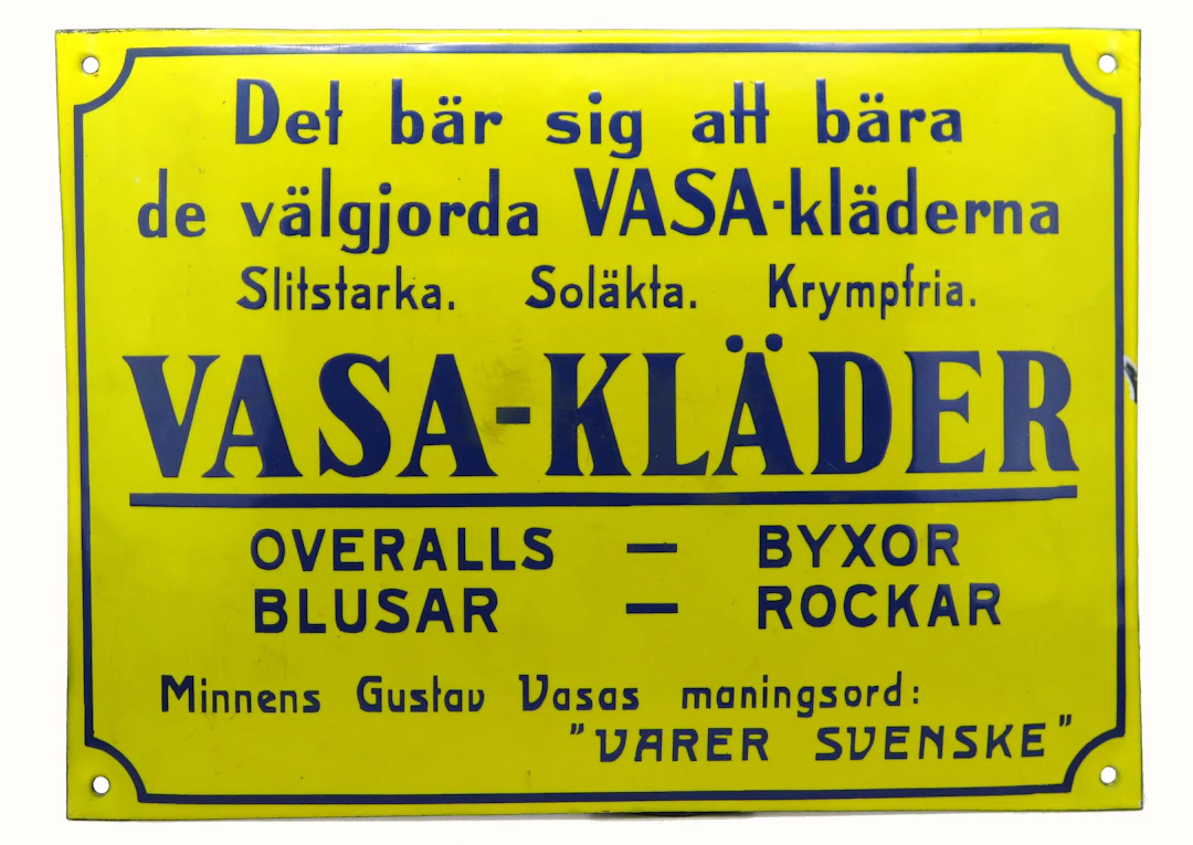 Reklamskylt, emaljerad koppar(?), 1900-talets början, "Vasa-Kläder"