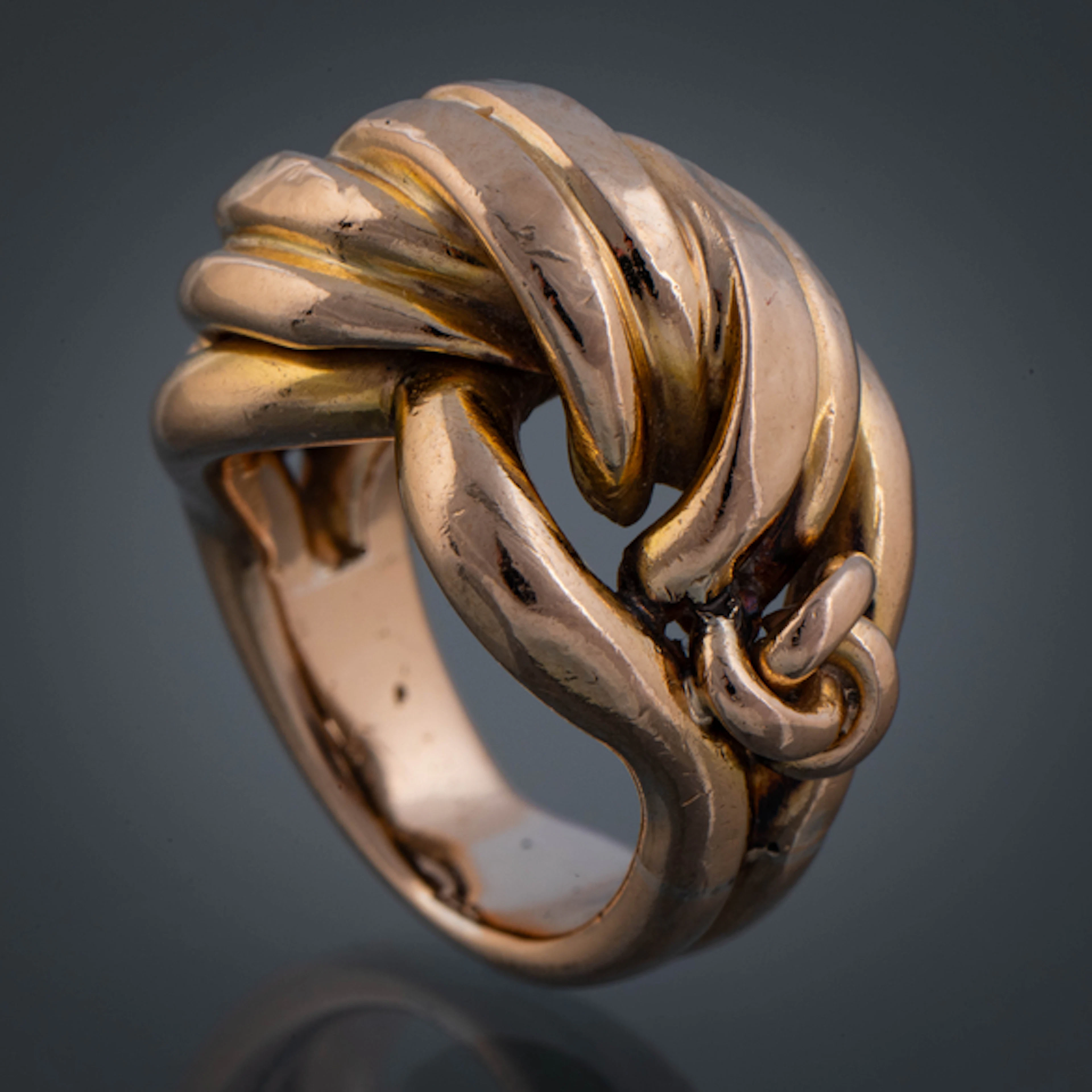 Anillo entrelazado en oro amarillo de 18 kt