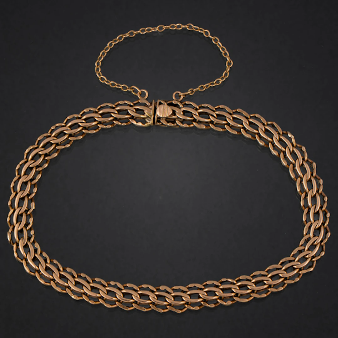 Pulsera de doble eslabón barbado en oro amarillo de 18 kt