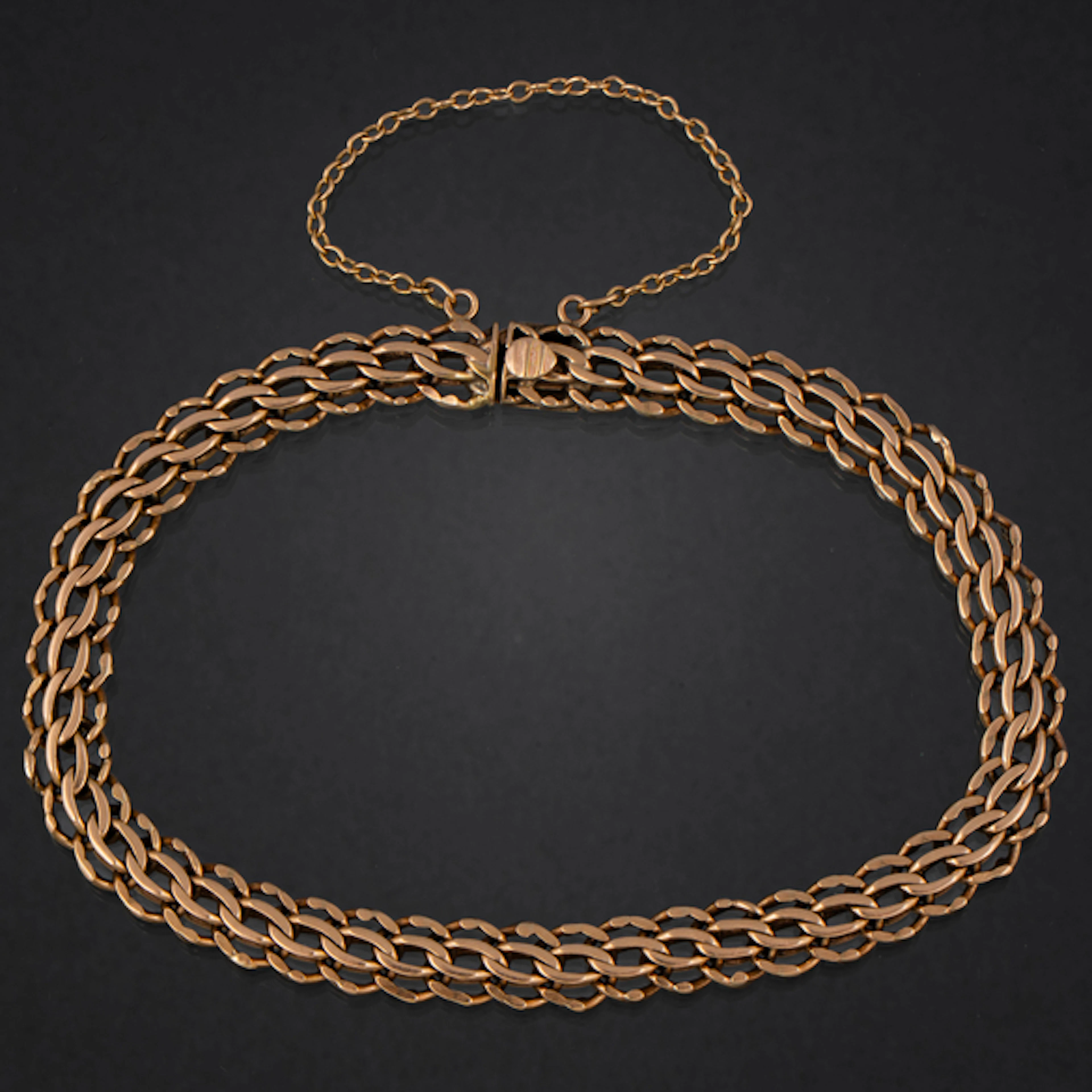 Pulsera de doble eslabón barbado en oro amarillo de 18 kt