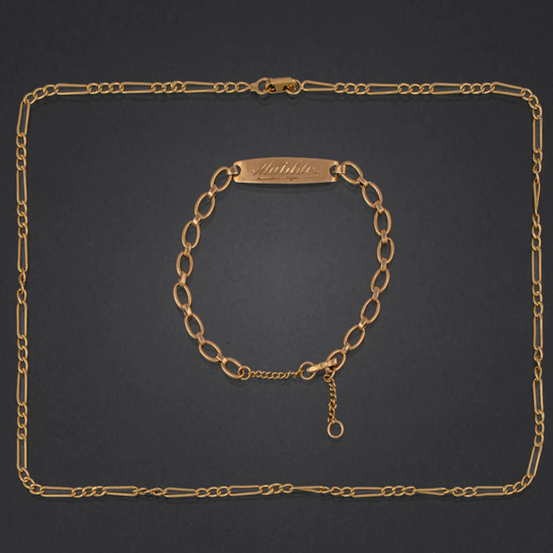 Conjunto de cadena y pulsera de eslabones en oro amarillo de 18 kt.