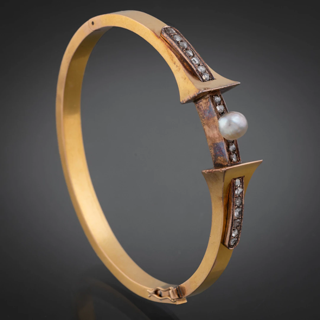 Pulsera rígida antigua en oro amarillo de 18 kt con brillantes talla