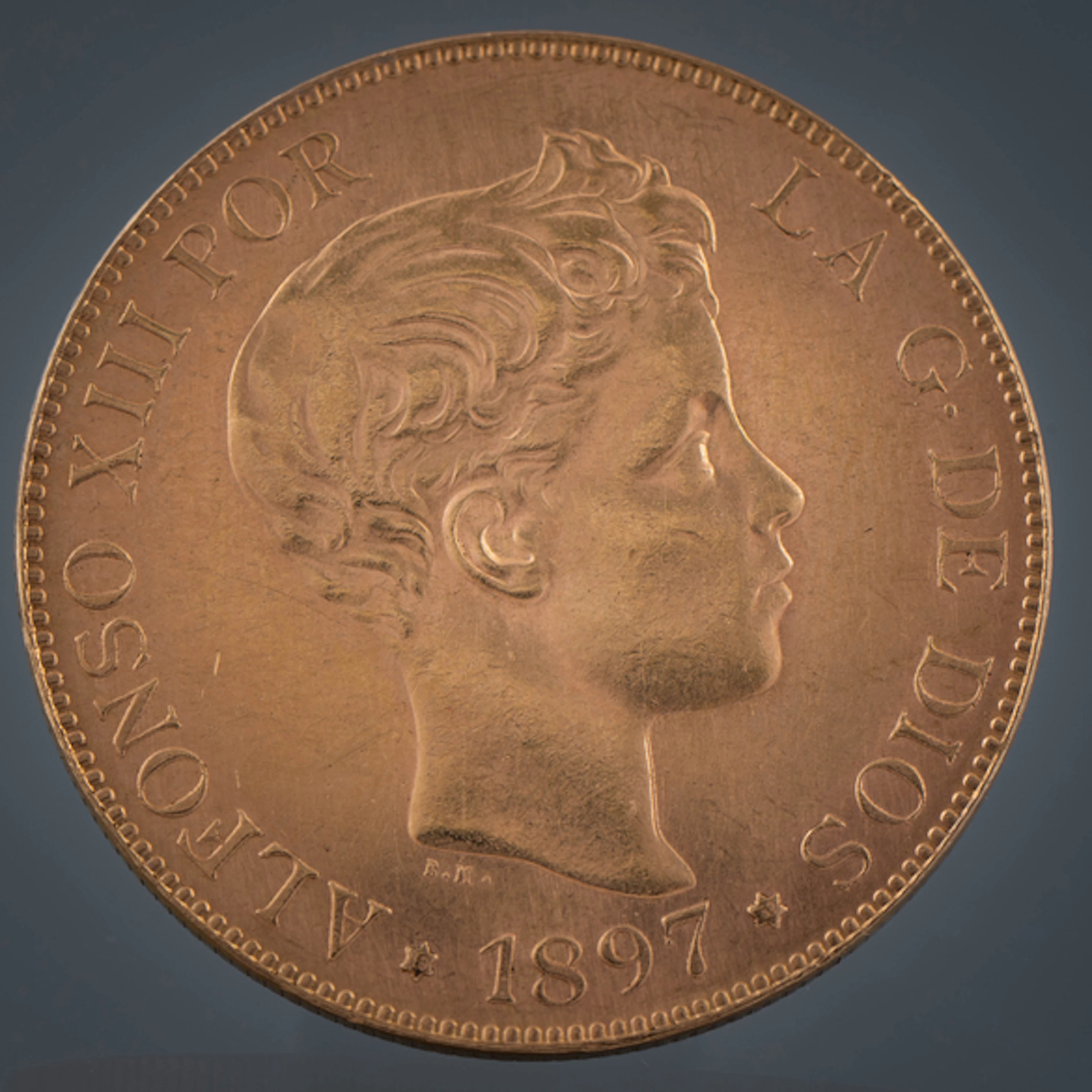 Moneda de cien pesetas de Alfonso XIII en oro de 22kt del año 1897.