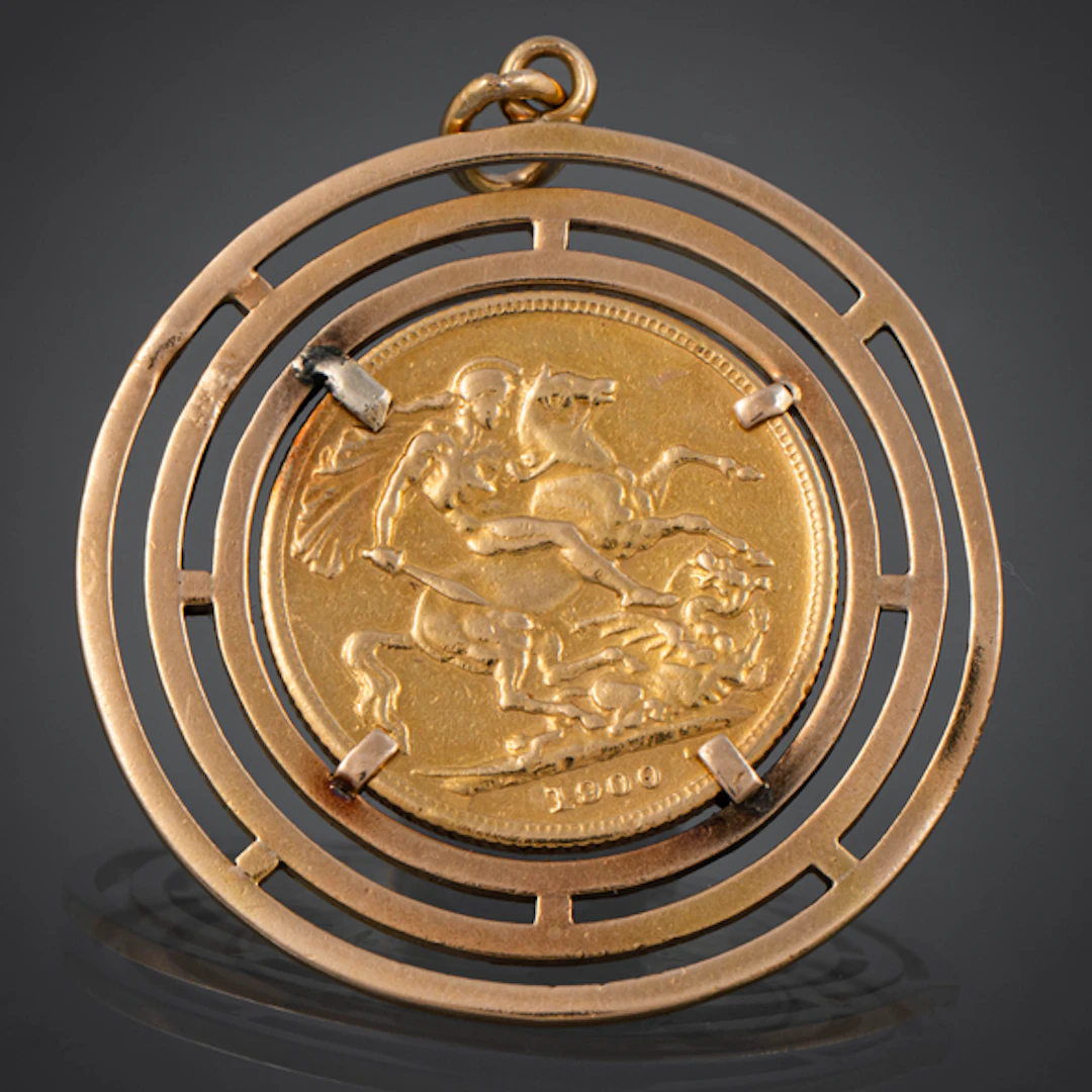 Colgante circular en oro amarillo de 18kt con moneda de la Reina Victoria