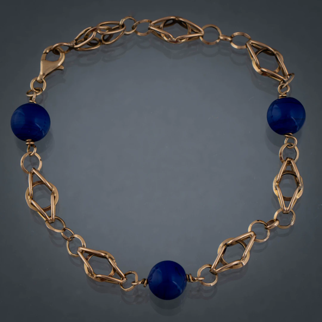 Bonita pulsera de eslabón abierto calado con cuentas esféricas de