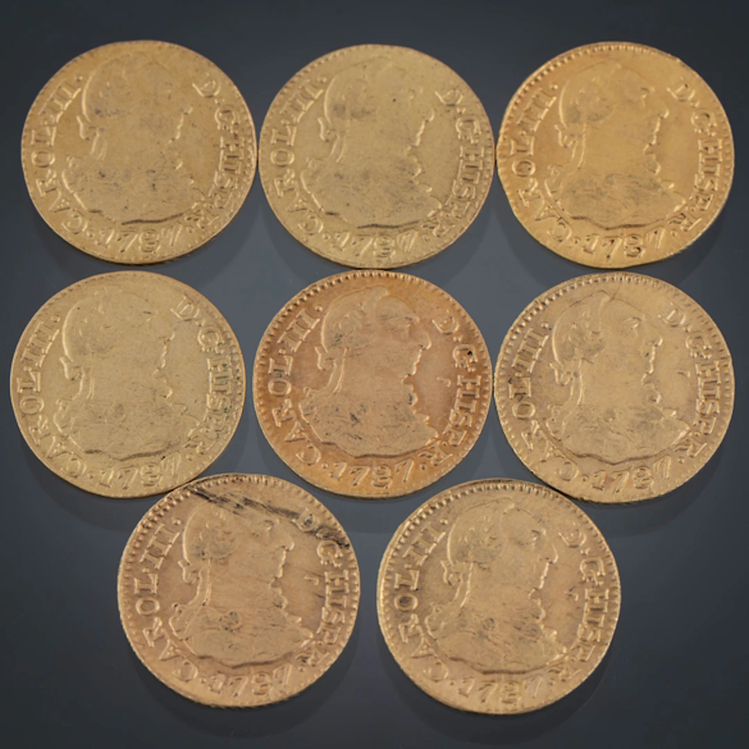 Conjunto de ocho monedas de medio escudo de Carlos III en oro amarillo