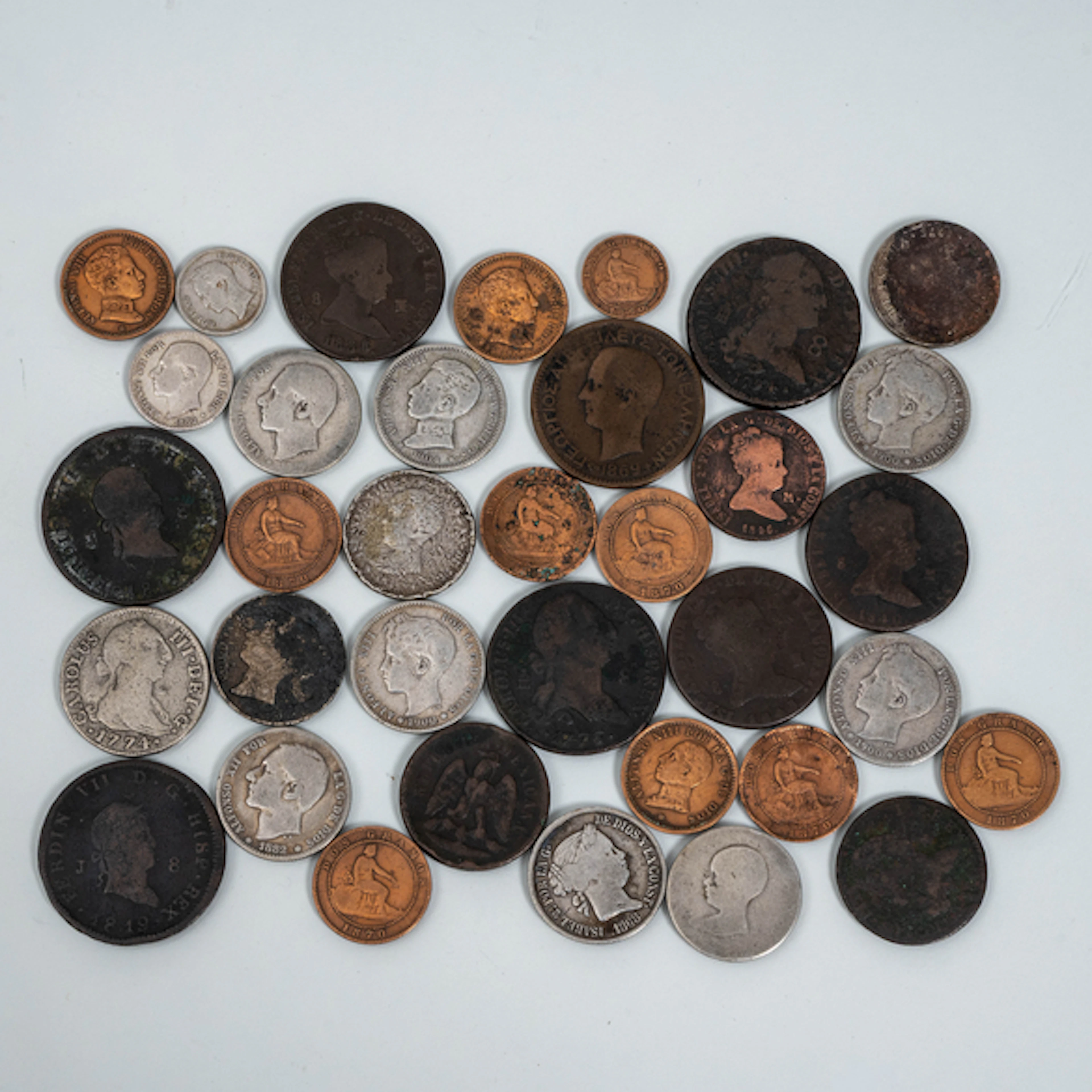 Conjunto de trece monedas en plata de Carlos III, Alfonso XII, Alfonso