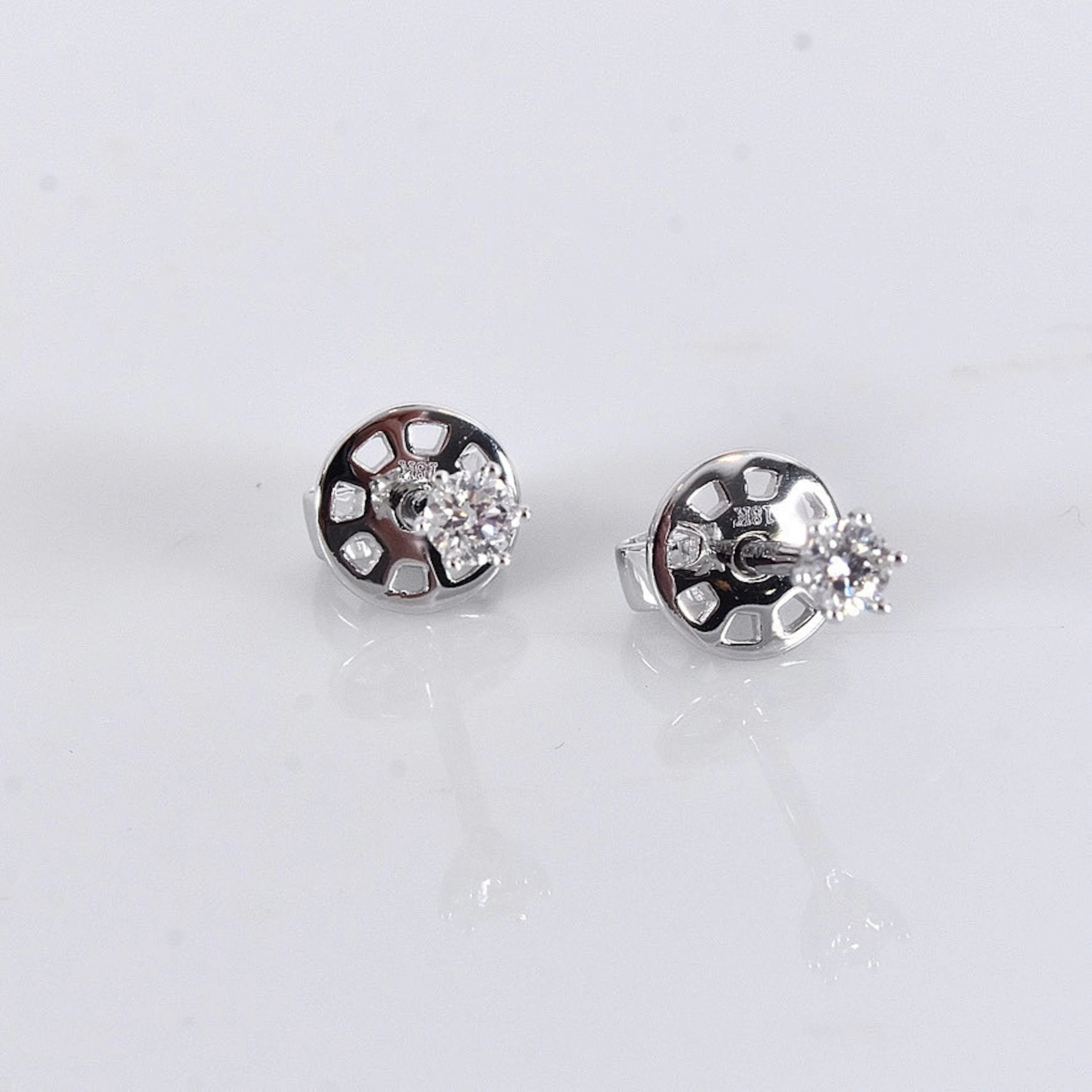 ENSTENSÖRHÄNGEN, 0,16ct, vitguld 18K.