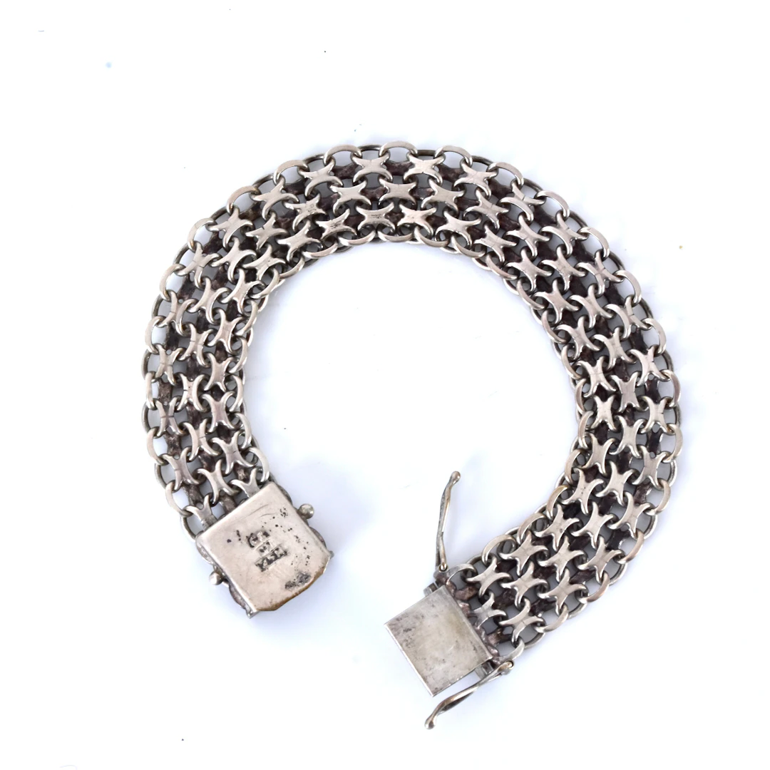 ARMBAND, X-länk, NSE Guldvaru AB Köping 1974, silver.