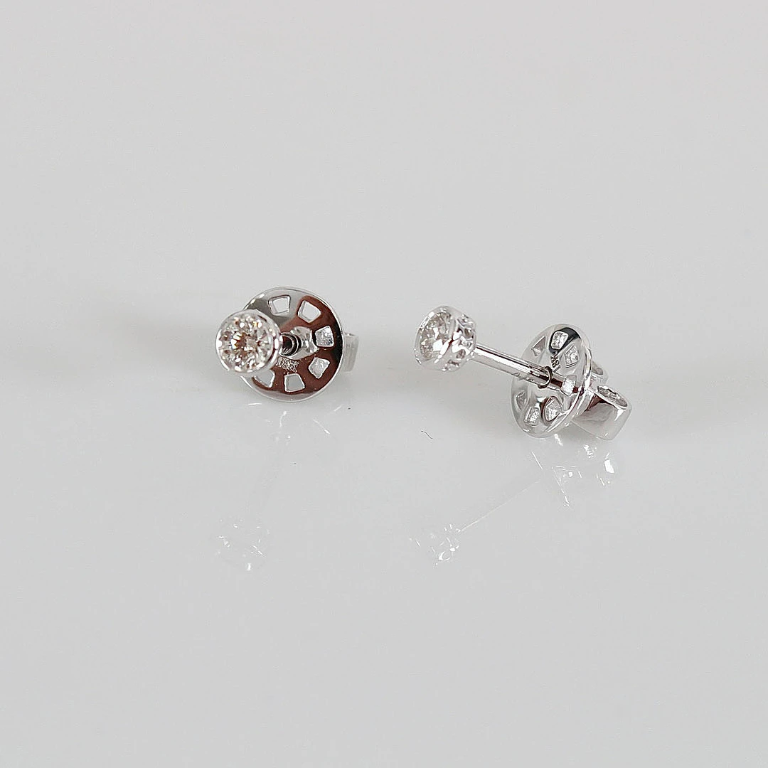 ENSTENSÖRHÄNGEN, 0,16ct, vitguld 18K.
