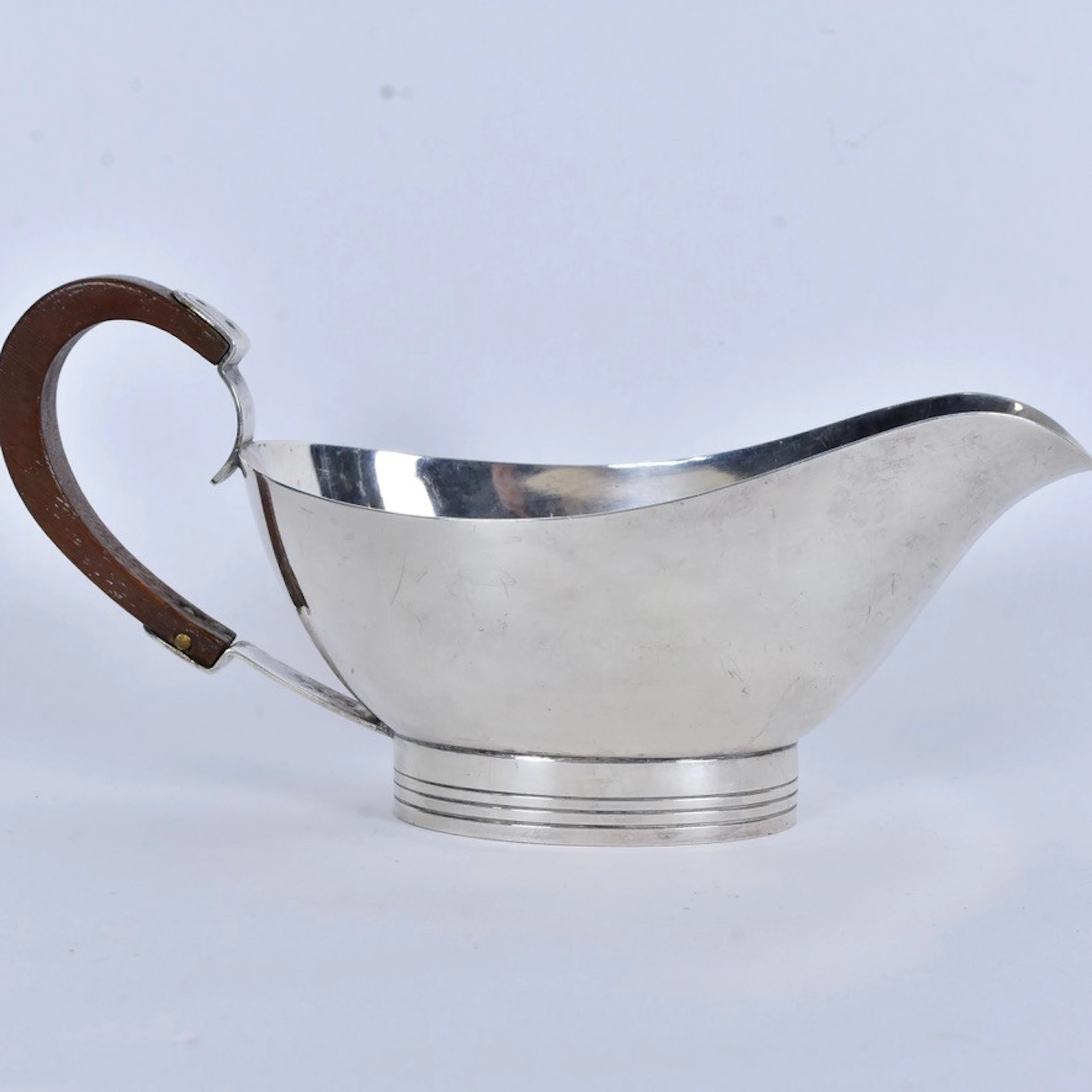 SÅSKANNA, nysilver med teakhandtag, CFA (Dansk Forsølvnings Anstalt).