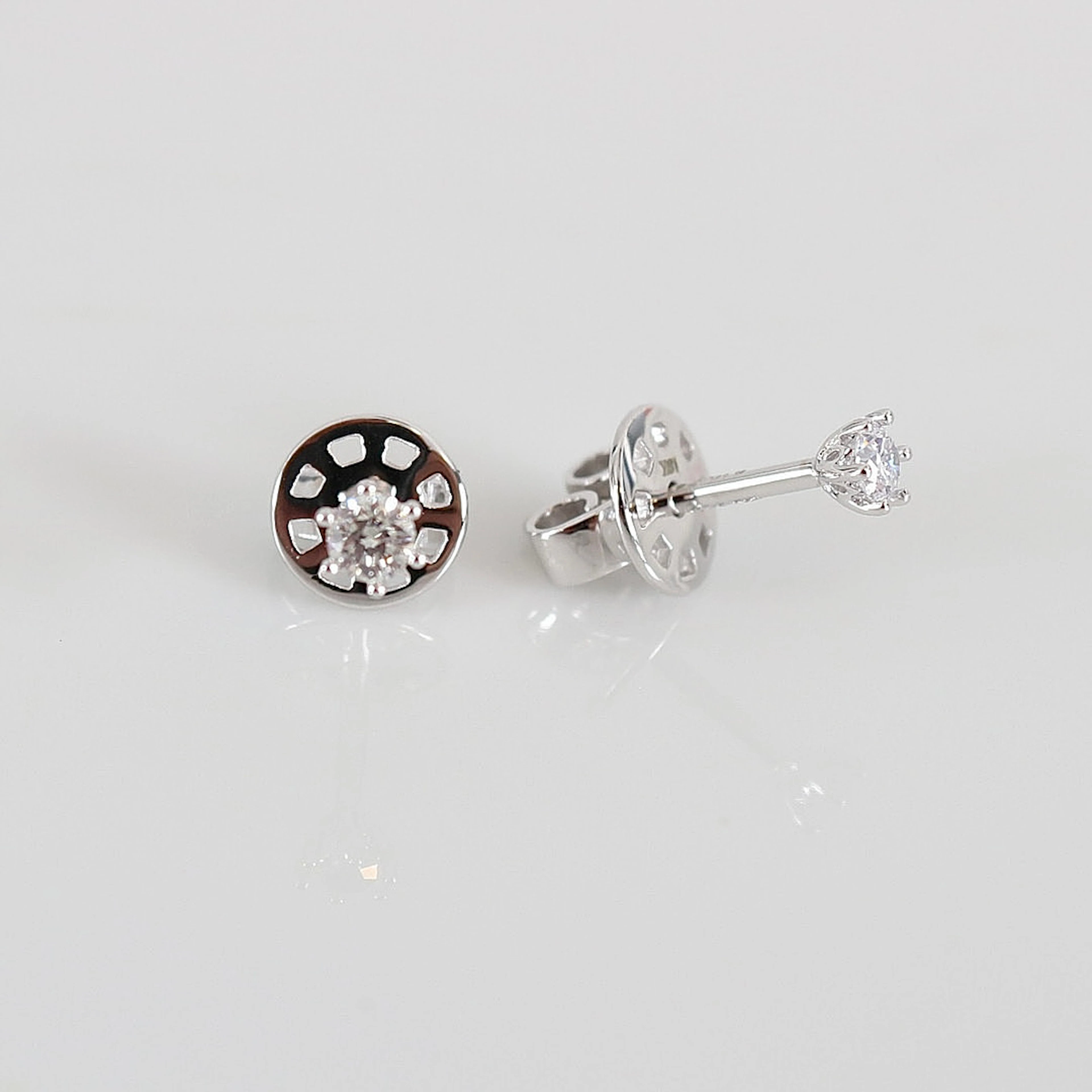 ENSTENSÖRHÄNGEN, 0,16ct, vitguld 18K.