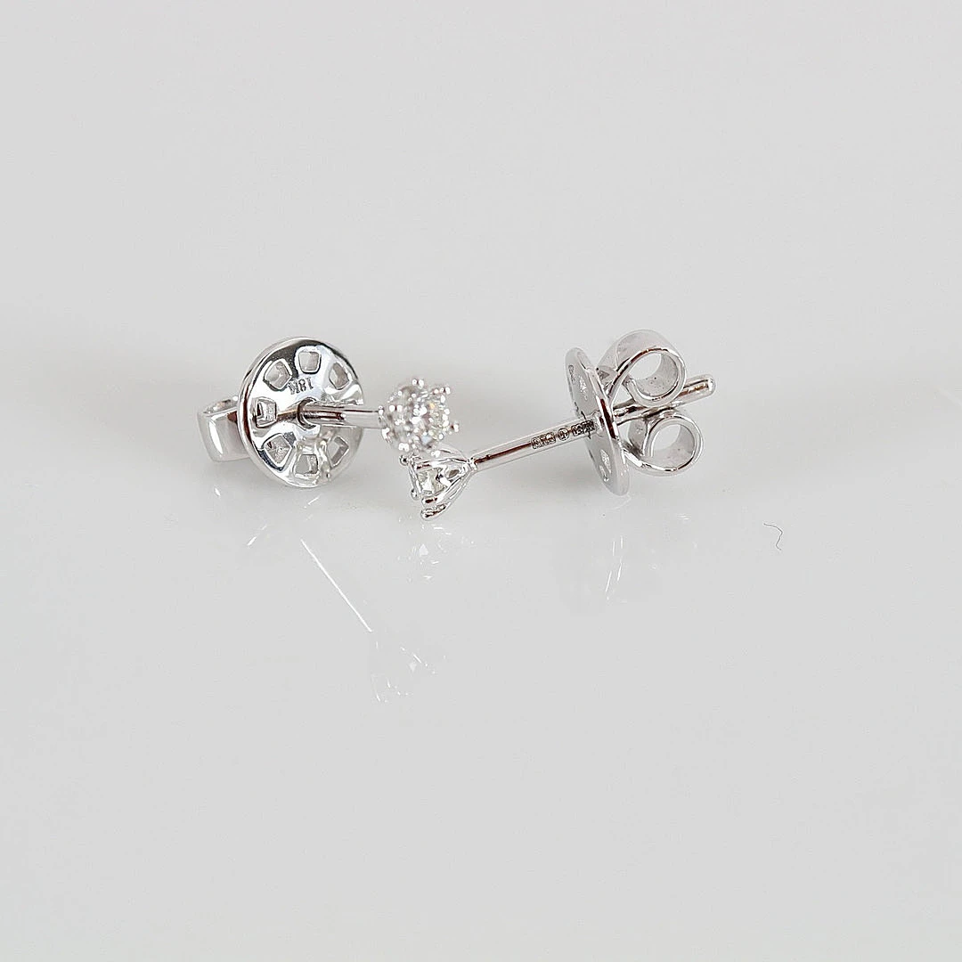 ENSTENSÖRHÄNGEN, 0,16ct, vitguld 18K.