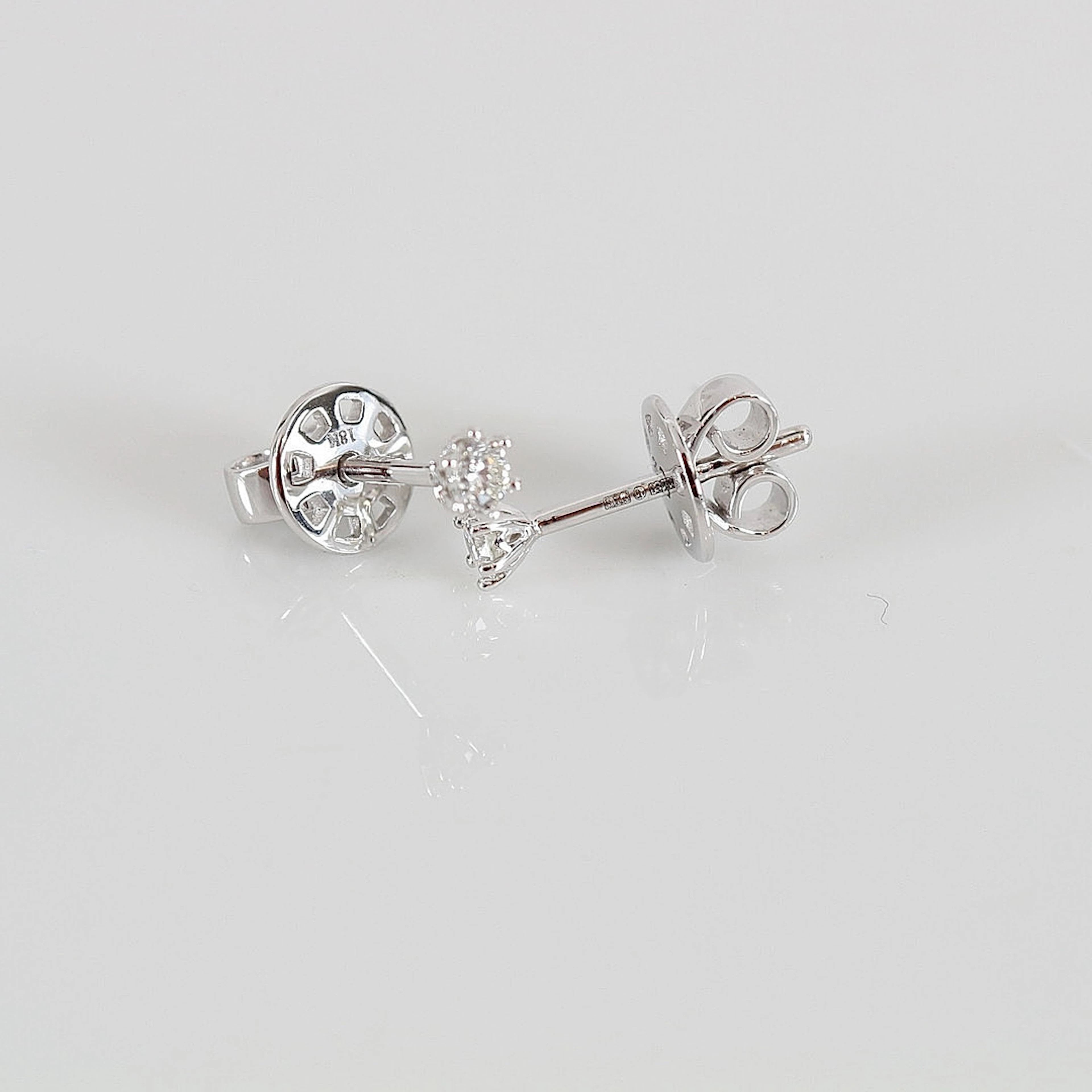 ENSTENSÖRHÄNGEN, 0,16ct, vitguld 18K.
