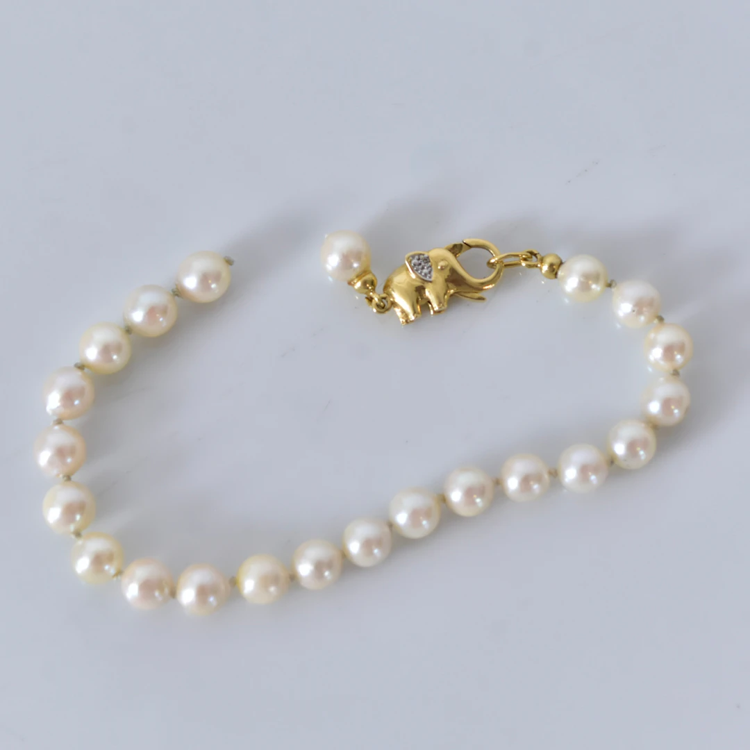 PÄRLARMBAND, med guldlås 18K.