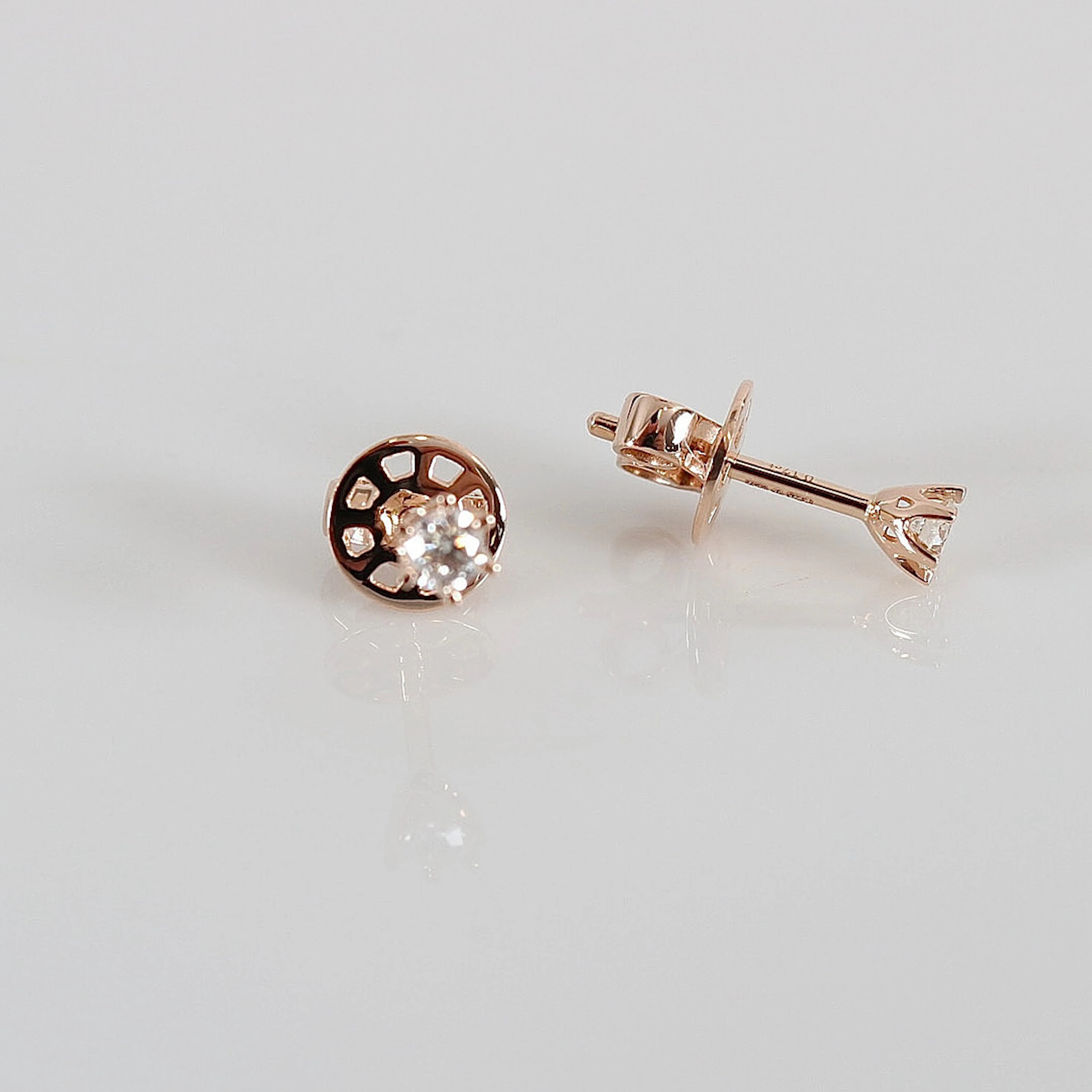 ENSTENSÖRHÄNGEN, 0,17ct, roséguld 18K.