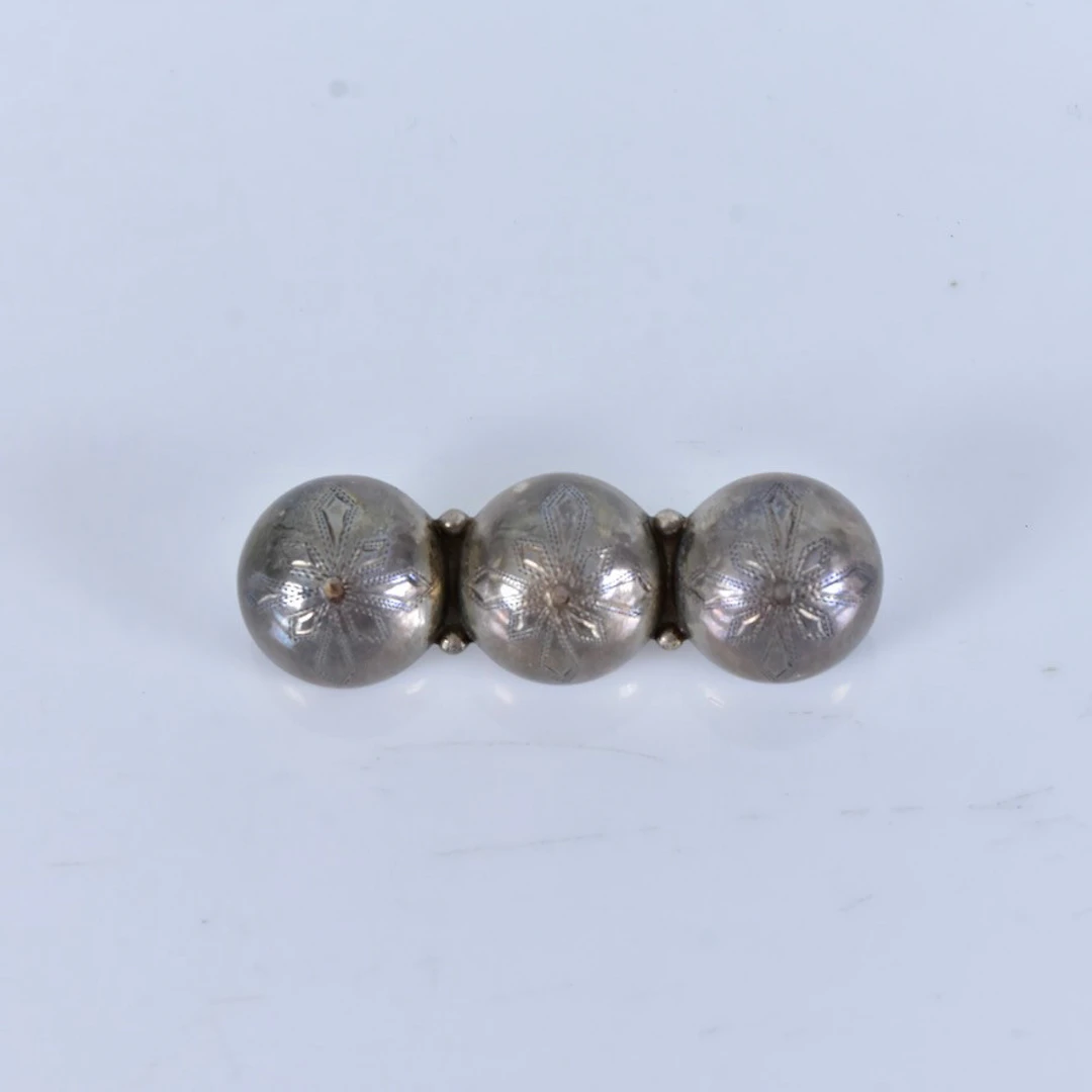 DRÄKTBROSCH, silver, signerad NOL 1902.