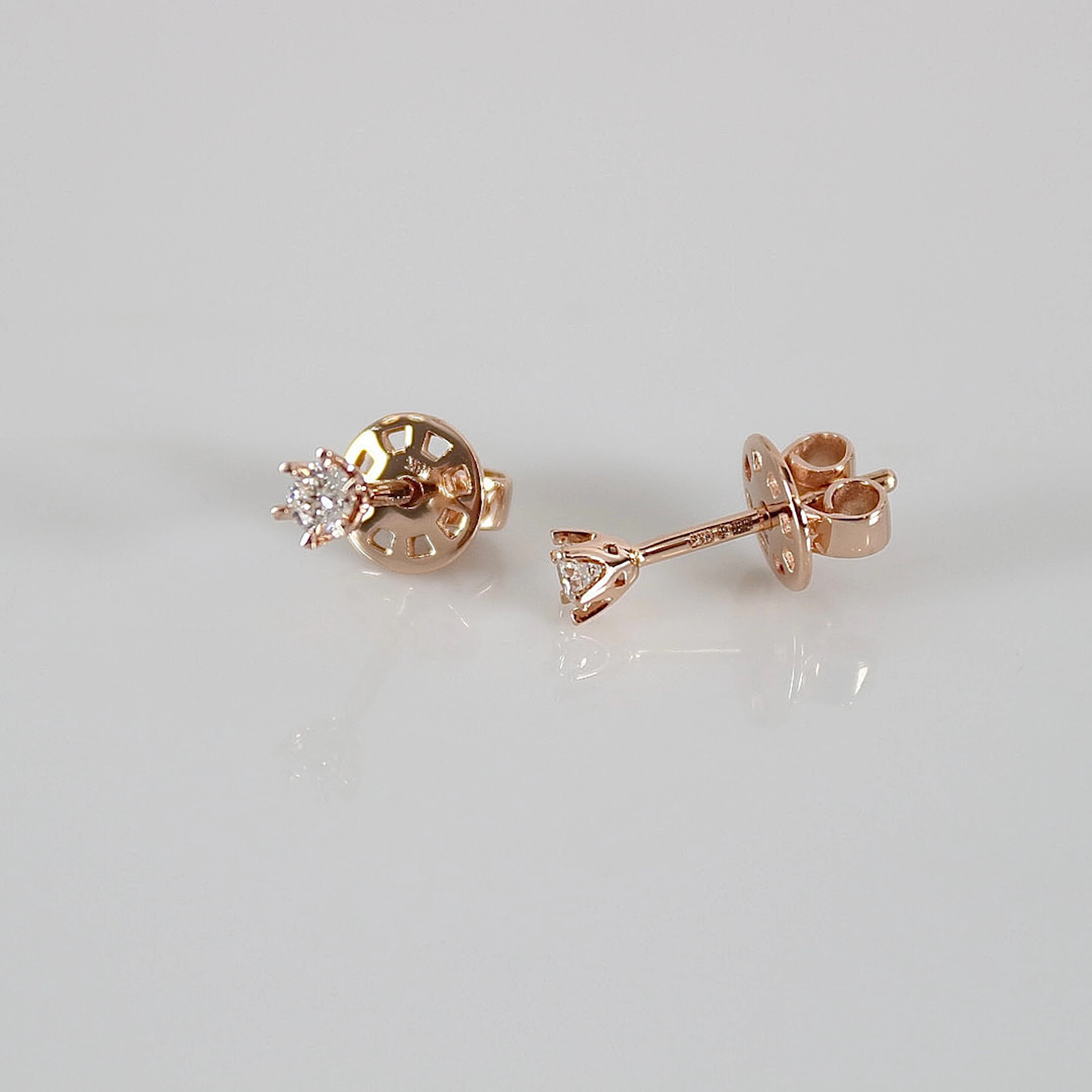 ENSTENSÖRHÄNGEN, 0,17ct, roséguld 18K.