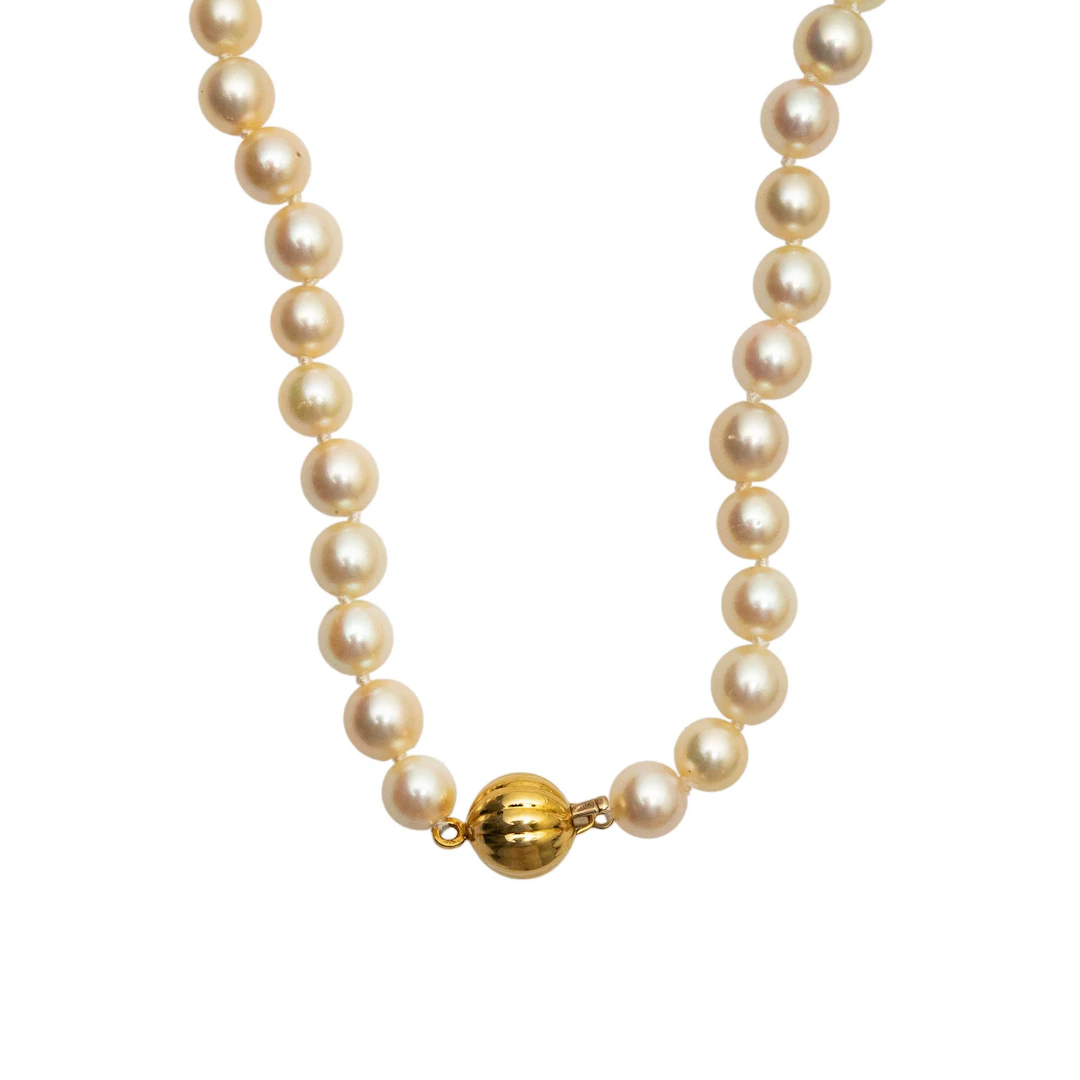 COLLAR CON PERLAS CULTIVADAS Y BROCHE EN ORO AMARILLO DE 18K