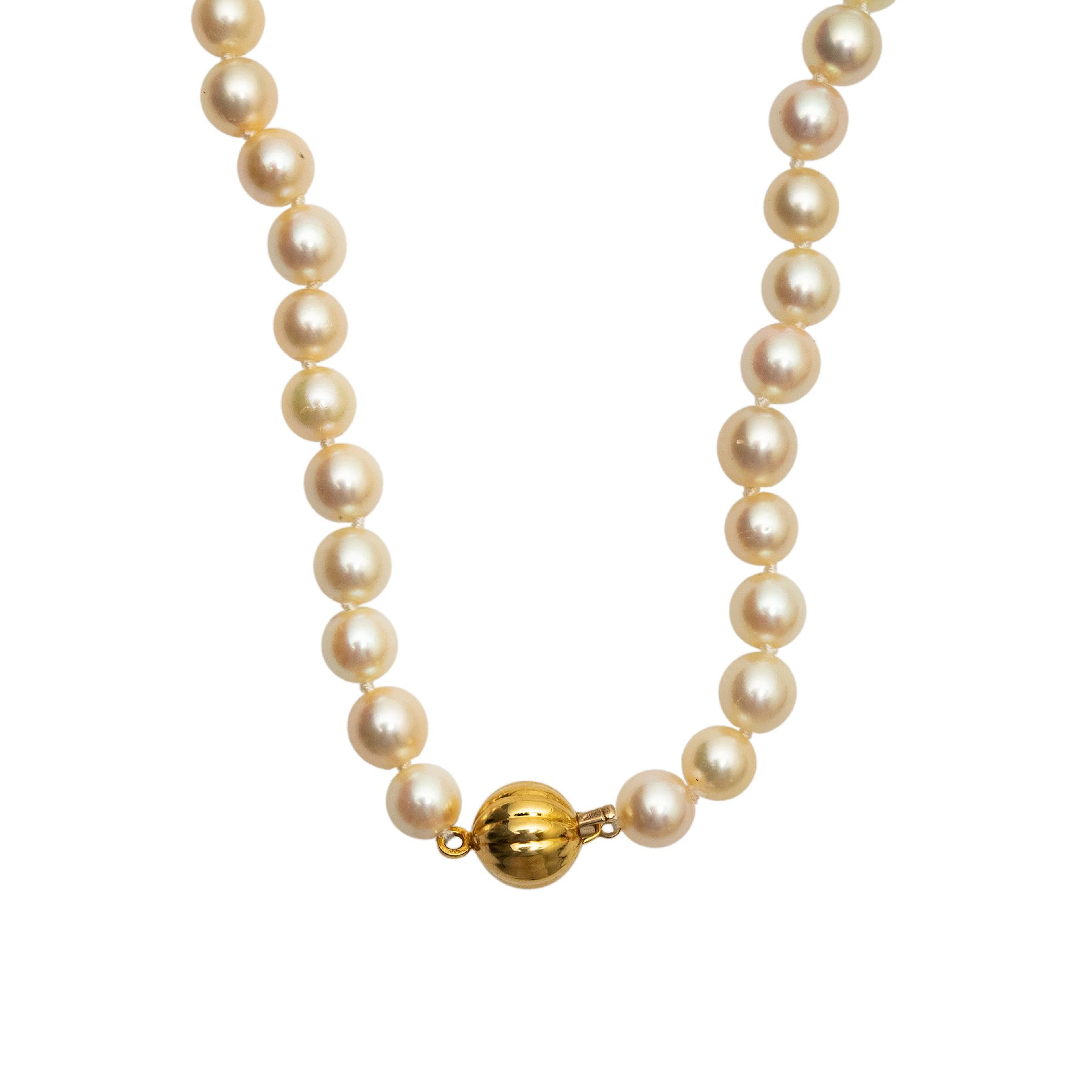 COLLAR CON PERLAS CULTIVADAS Y BROCHE EN ORO AMARILLO DE 18K