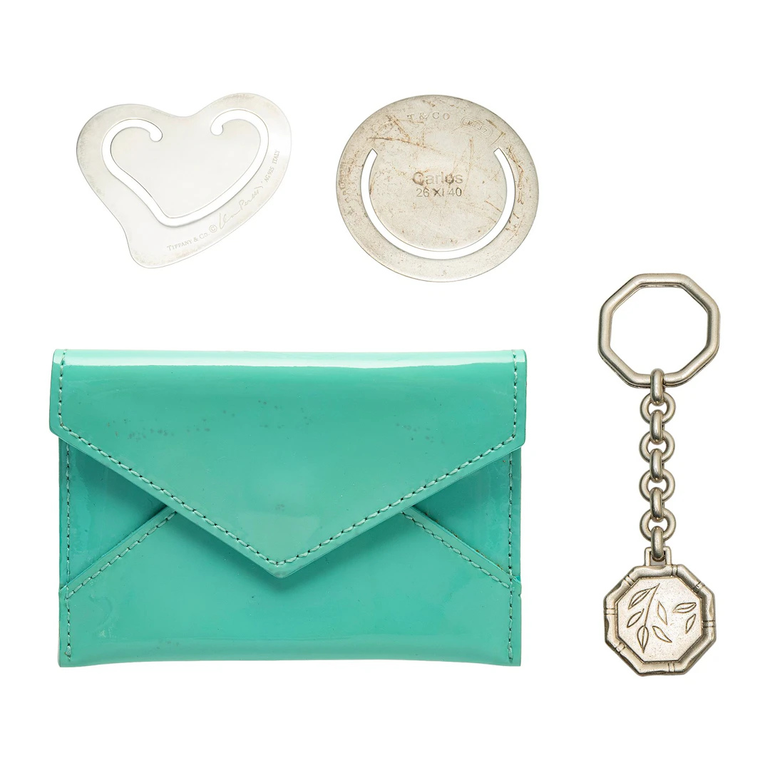 CUATRO ARTICULOS PERSONALES DE LA FIRMA TIFFANY & CO.
