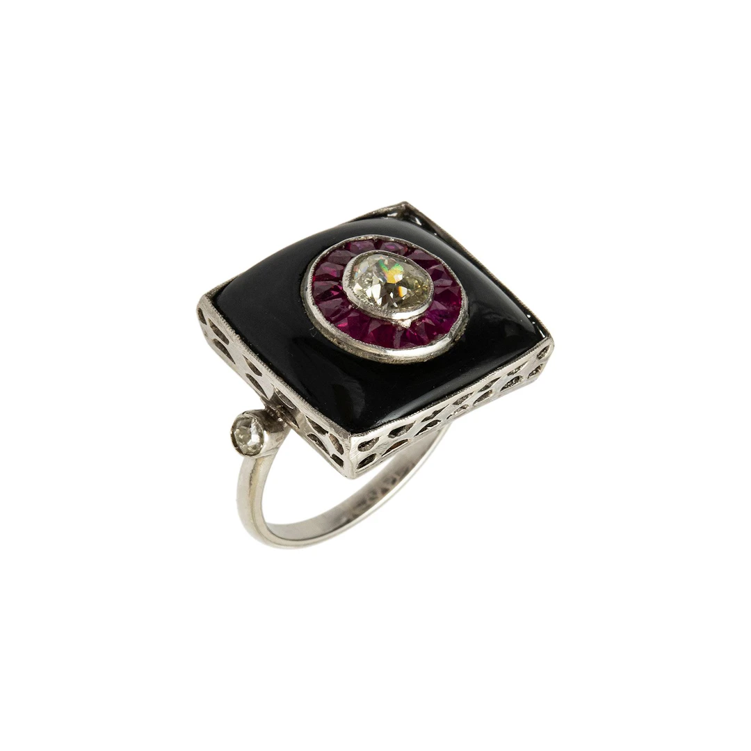 ANILLO CON DIAMANTE Y RUBÍES EN PLATINO PT 900