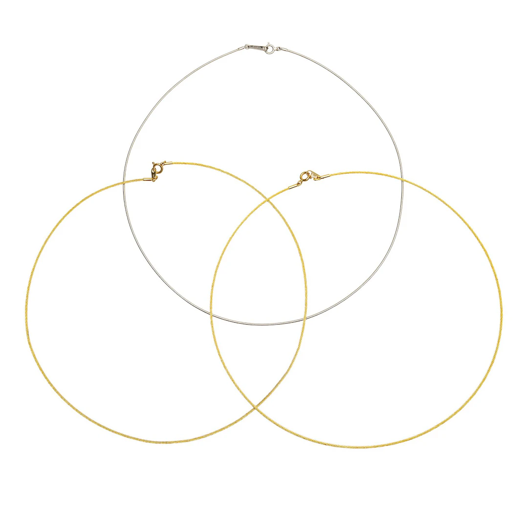 TRES GARGANTILLAS EN ORO AMARILLO Y BLANCO DE 18K