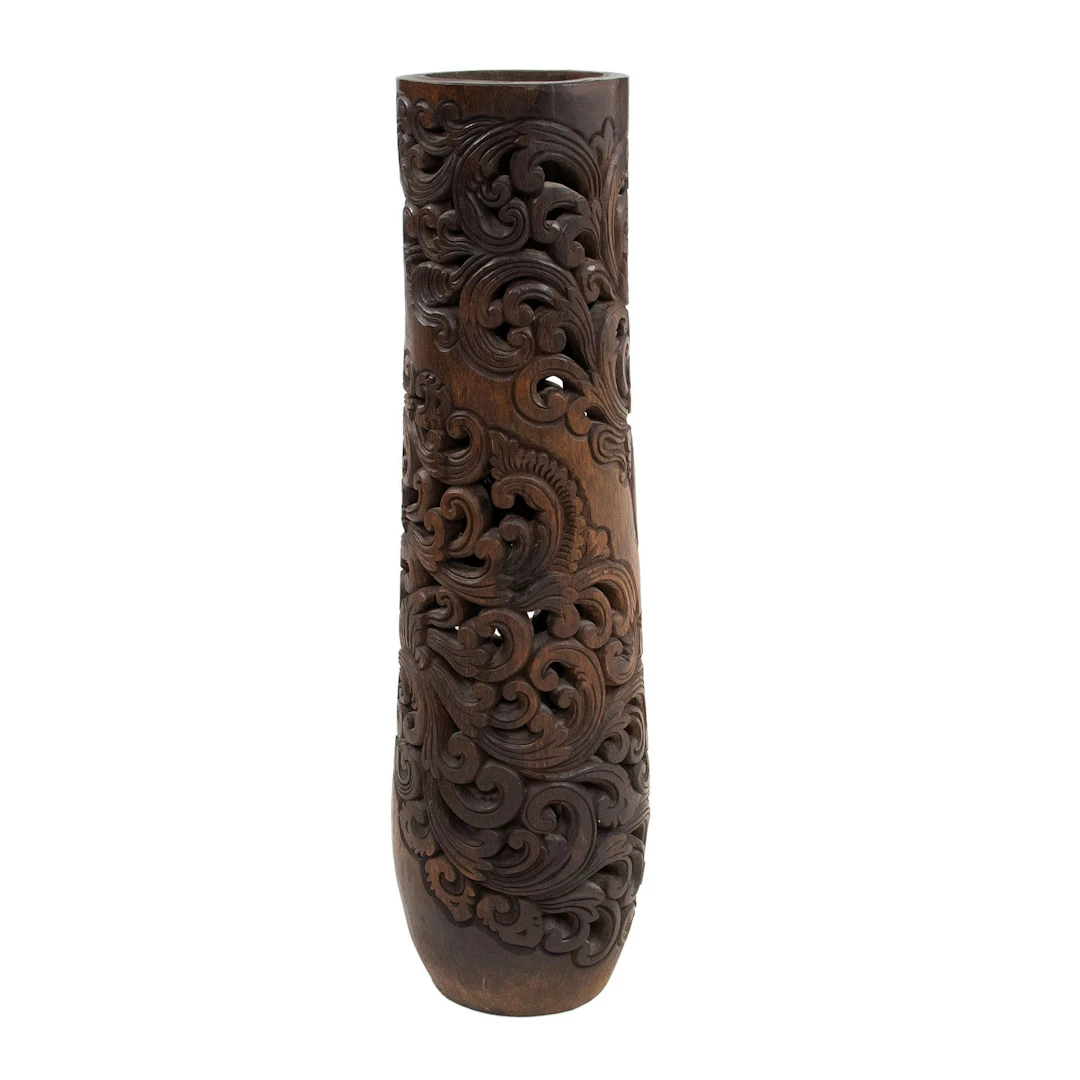 COLUMNA, SXX. Estilo Balinés. En madera de palma tallada y laqueada.