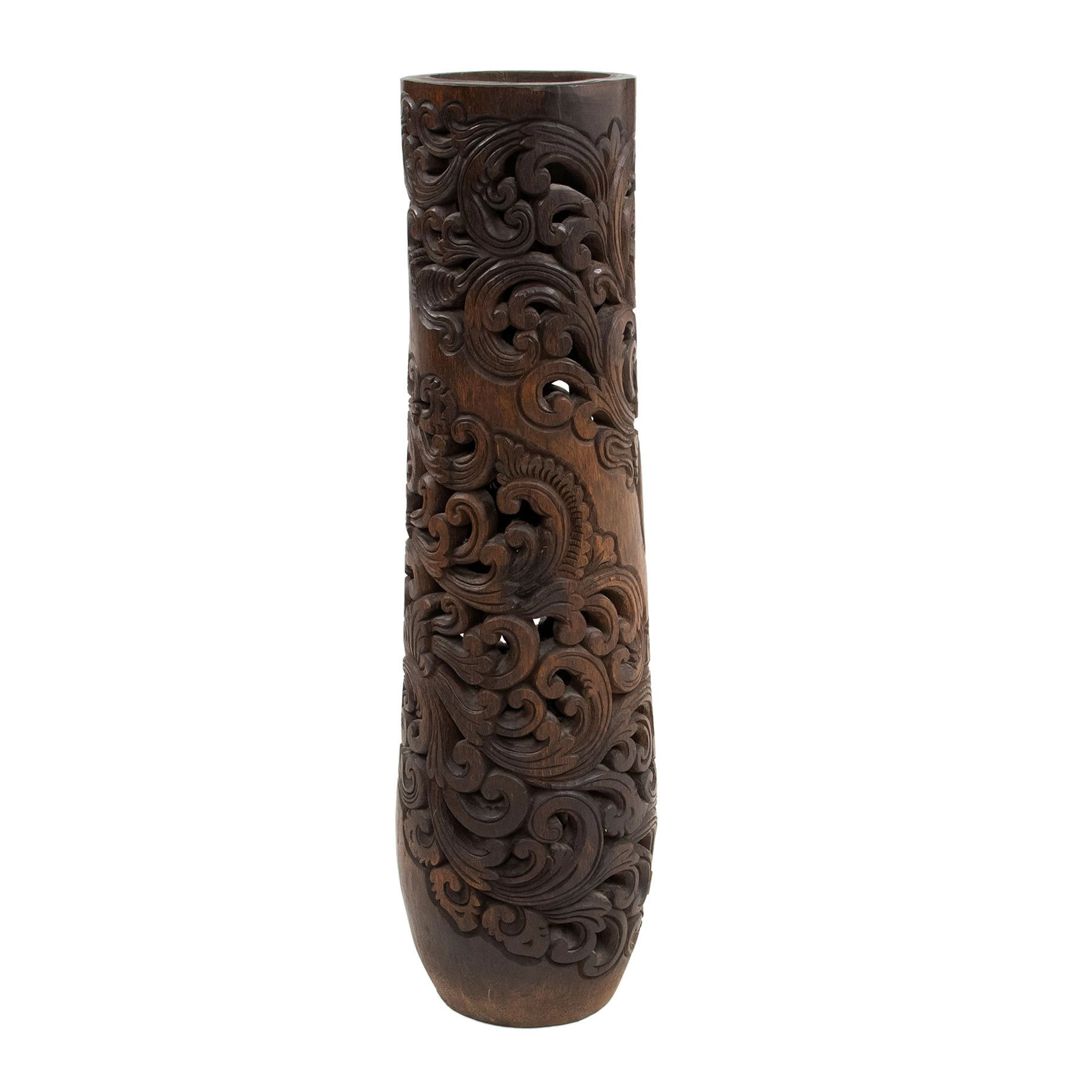 COLUMNA, SXX. Estilo Balinés. En madera de palma tallada y laqueada.