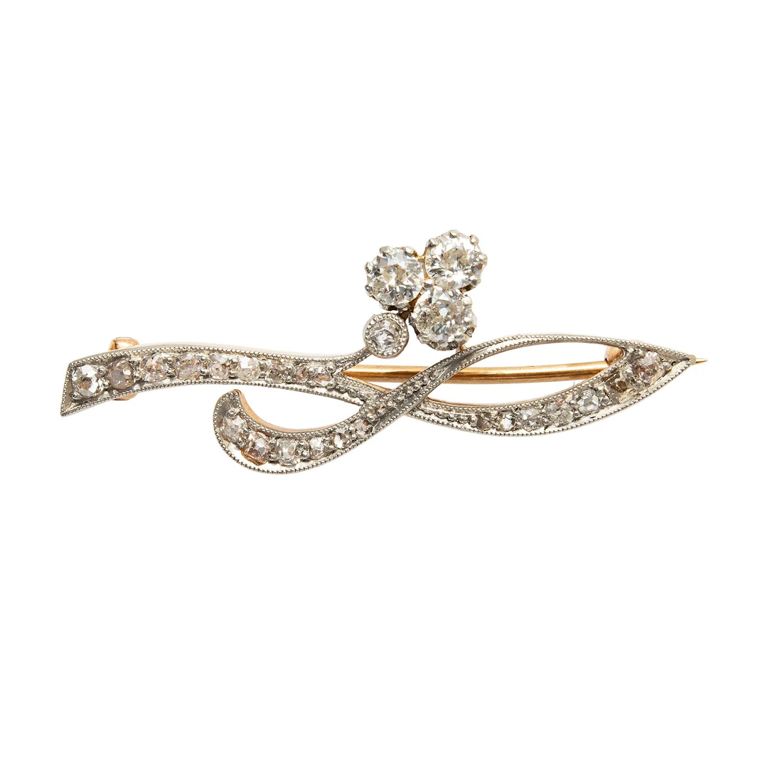 PRENDEDOR CON DIAMANTES EN ORO AMARILLO DE 12K Y PLATINO