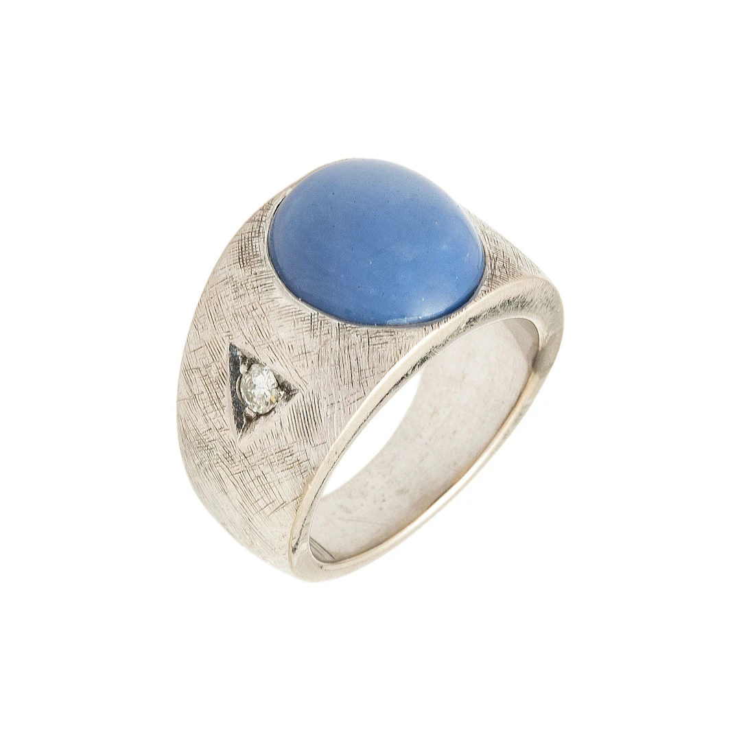 ANILLO CON ZAFIRO ESTRELLA Y DIAMANTES EN PLATA PALADIO