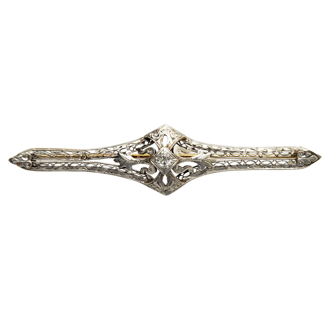 PRENDEDOR CON DIAMANTE EN ORO AMARILLO DE 14K Y PLATINO