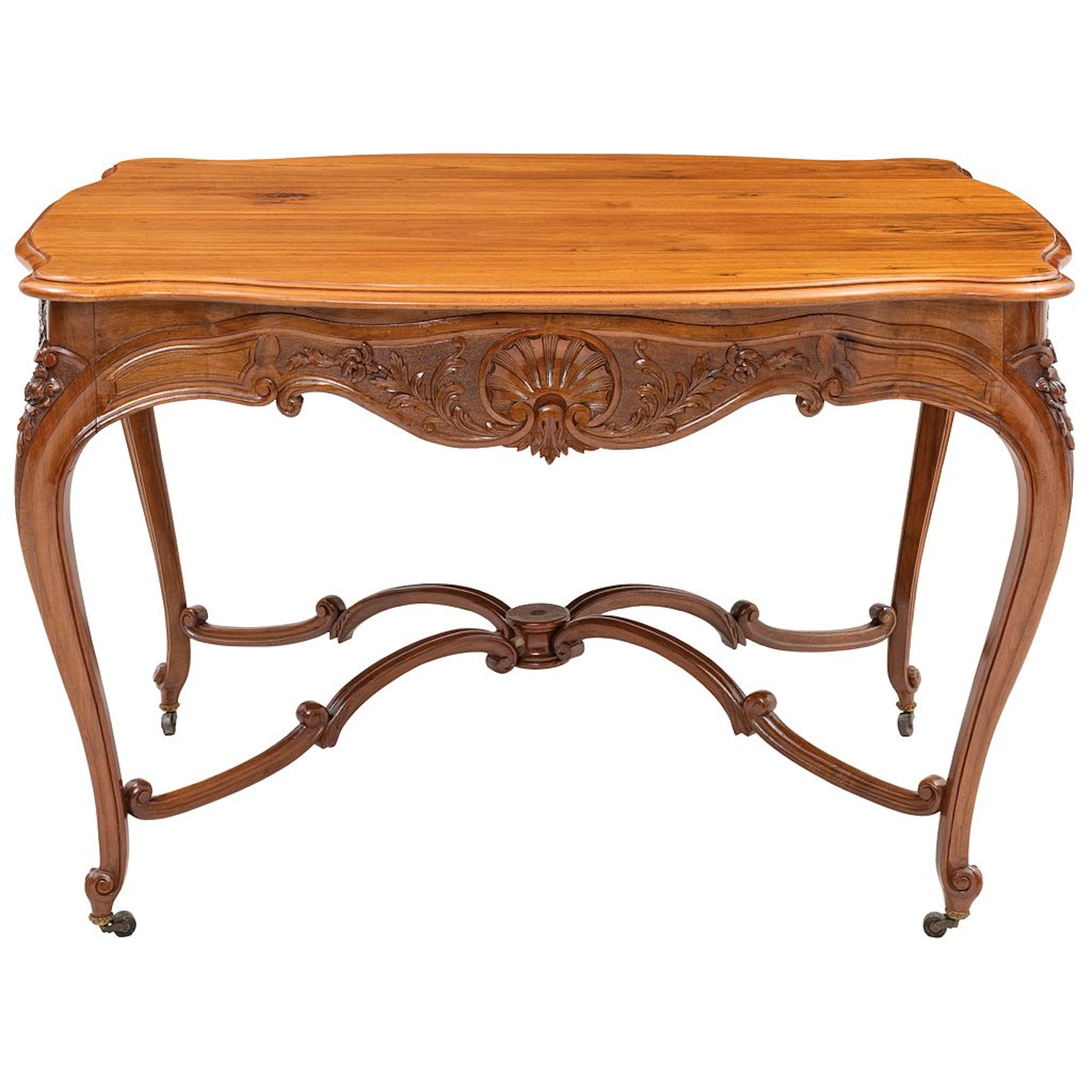 MESA. EUROPA, SIGLO XIX. En madera tallada Decorada con motivos orgánicos