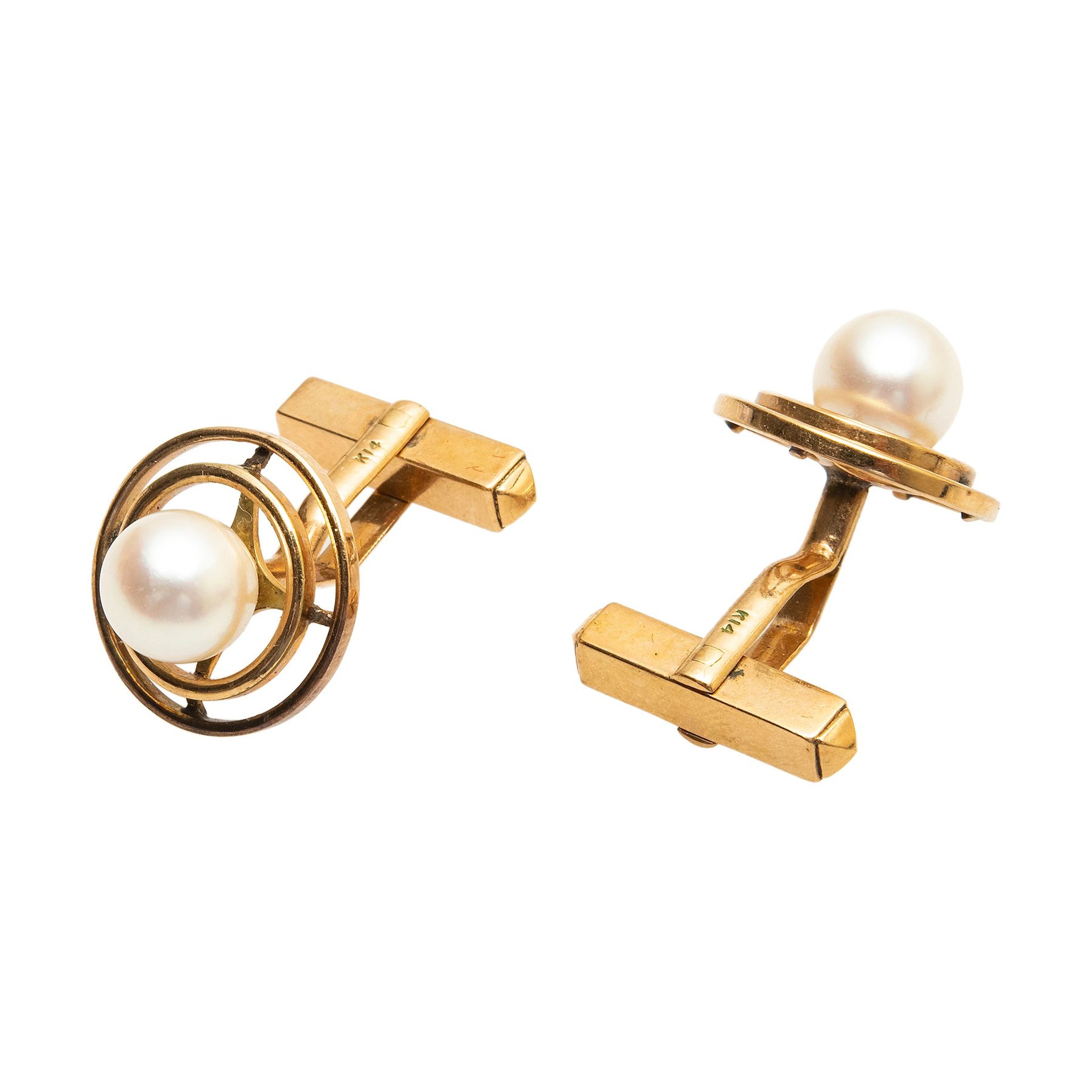 PAR DE MANCUERNILLAS CON PERLAS CULTIVADAS EN ORO AMARILLO DE 14K
