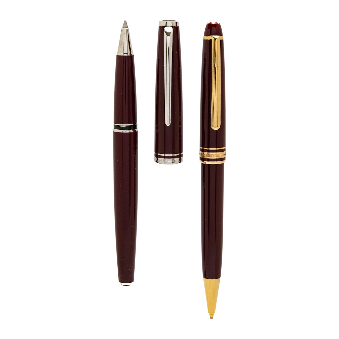 DOS ARTICULOS DE ESCRITURA MONTBLANC EN RESINA, METAL DORADO Y PLATEADO