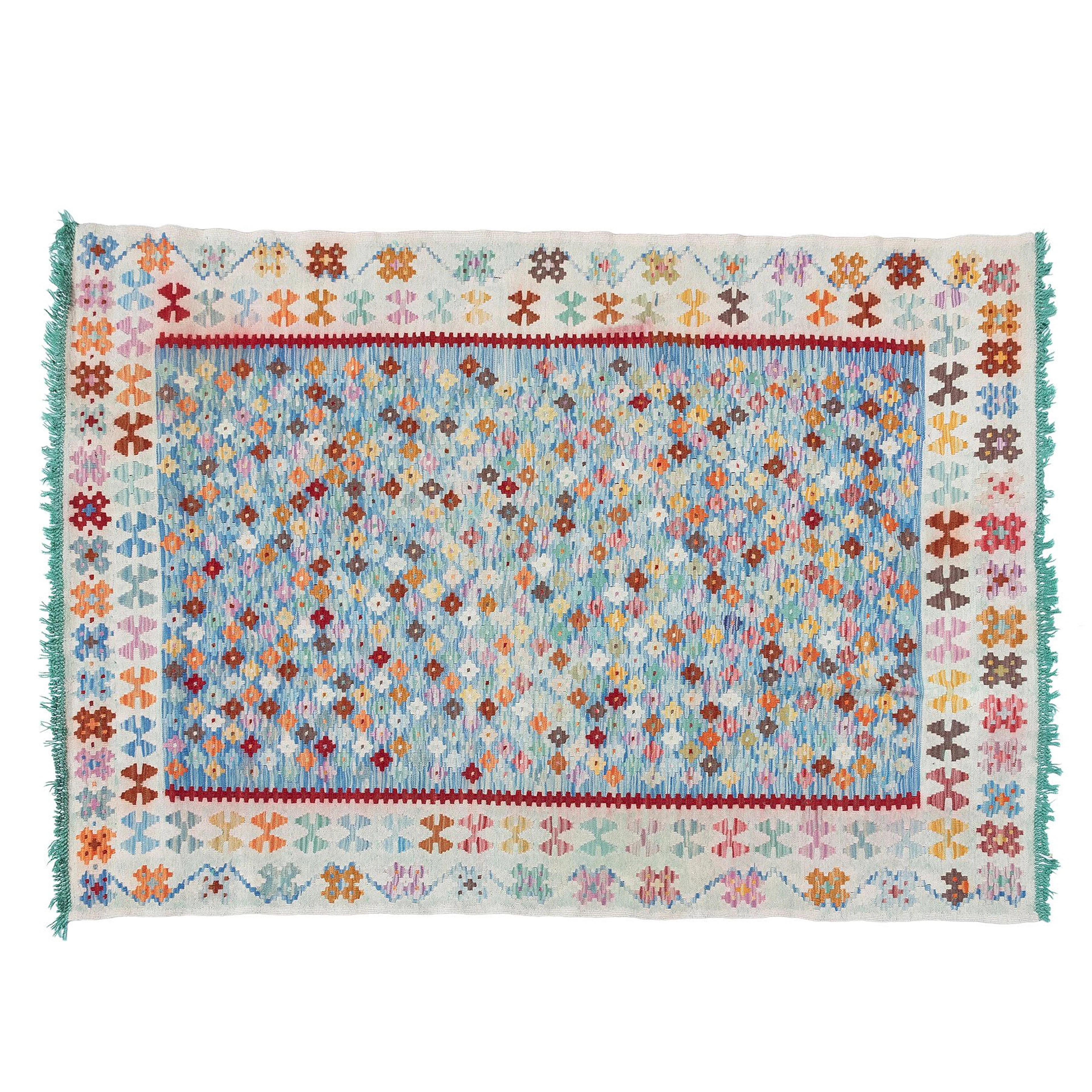 TAPETE KILIM, SXX. Anudado en fibras de lana. Campo decorado con patrones