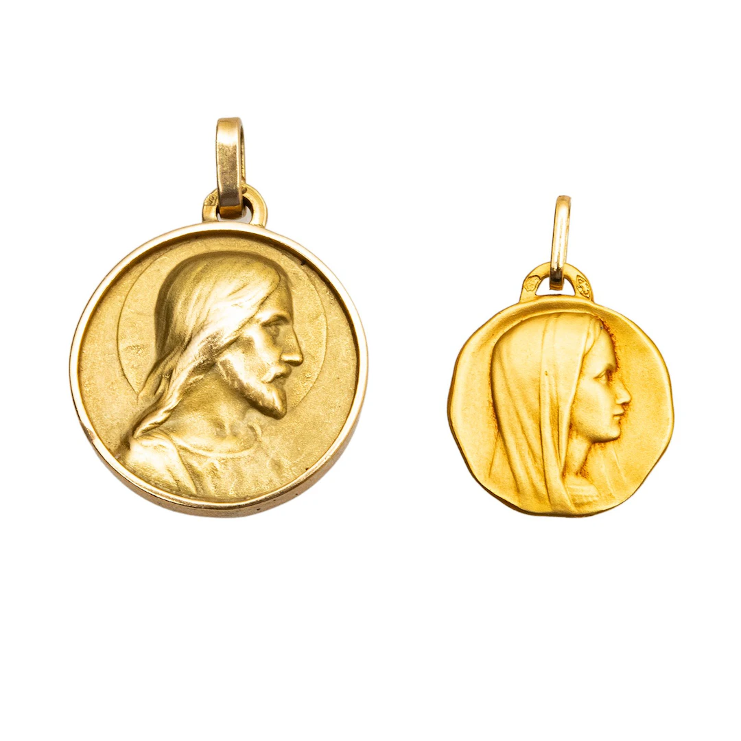 DOS MEDALLAS RELIGIOSAS EN ORO AMARILLO DE 18K