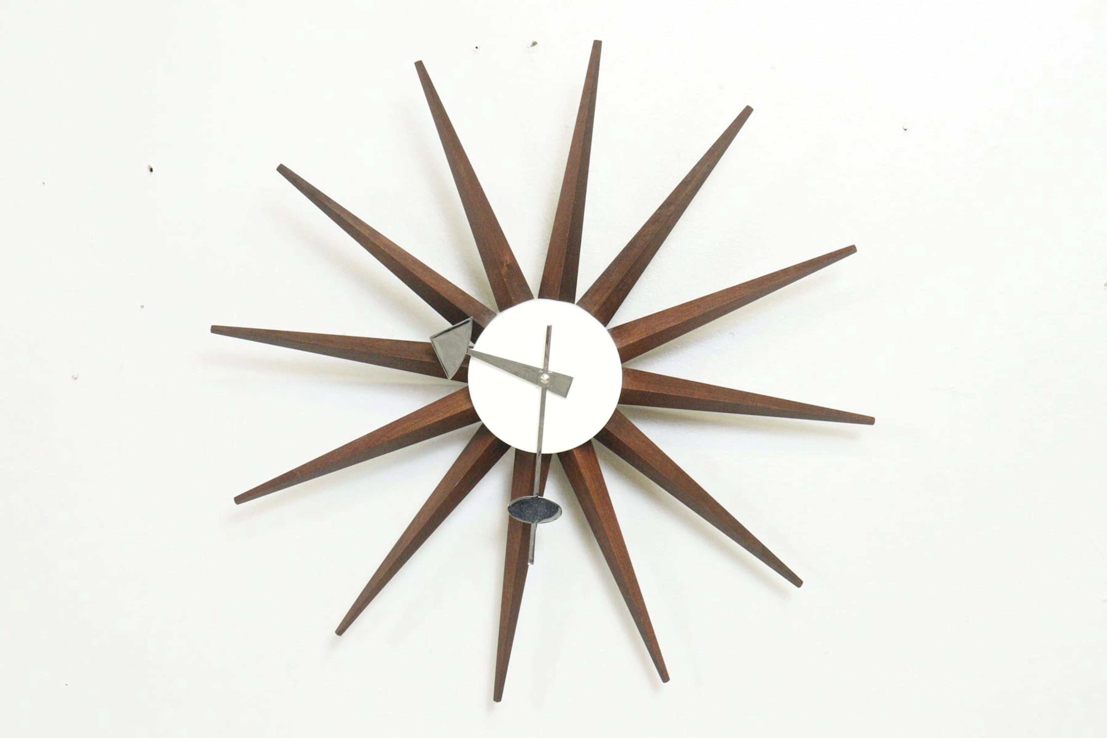 Väggur, "Sunburst", George Nelson, Vitra Design, etikettmärkt, trä och metall